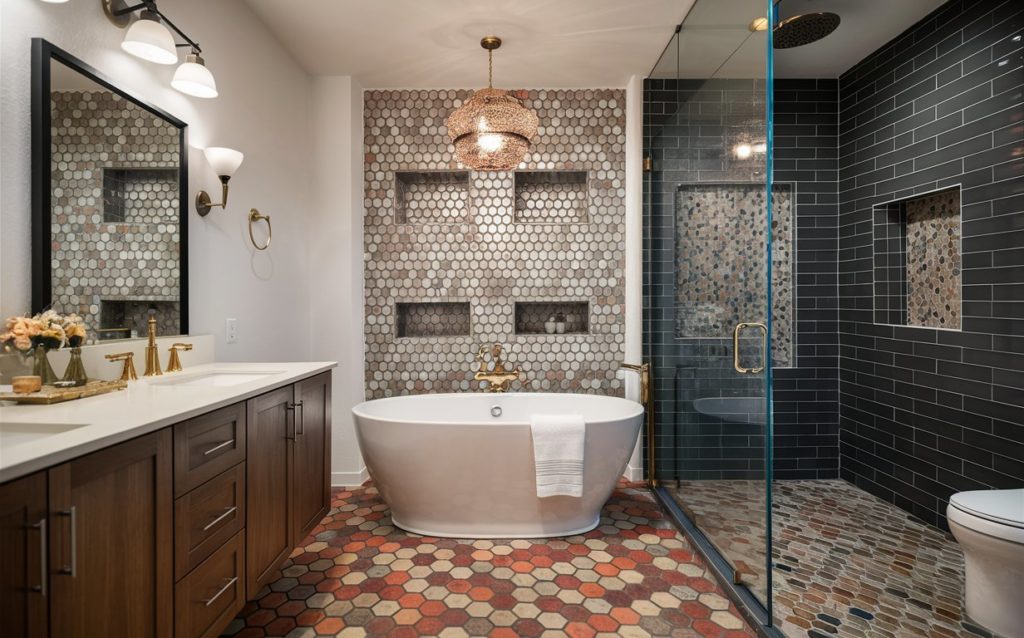 Bright bathroom with soaking tub and glass-enclosed shower