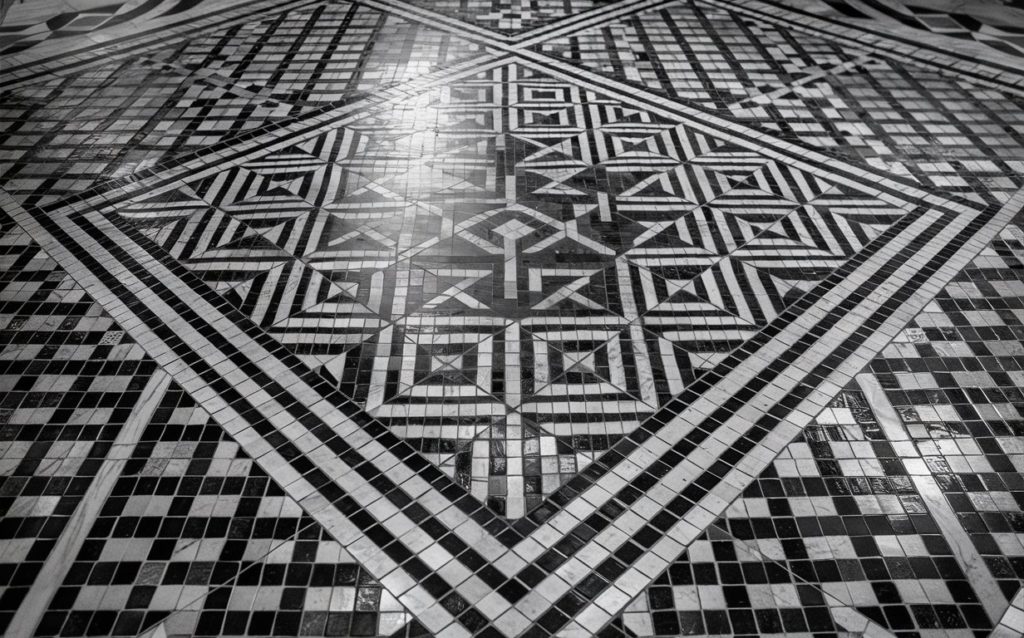 Close-up of a black and white mosaic tile floor
