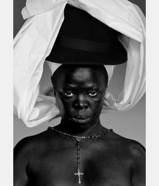 woman wrapped in materials