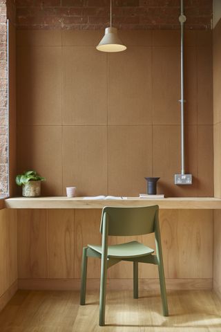 the loom club interiors with timber cladding and soft curtains dividing the space