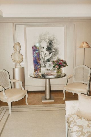 hotel de crillon interior, with painted skateboard on table