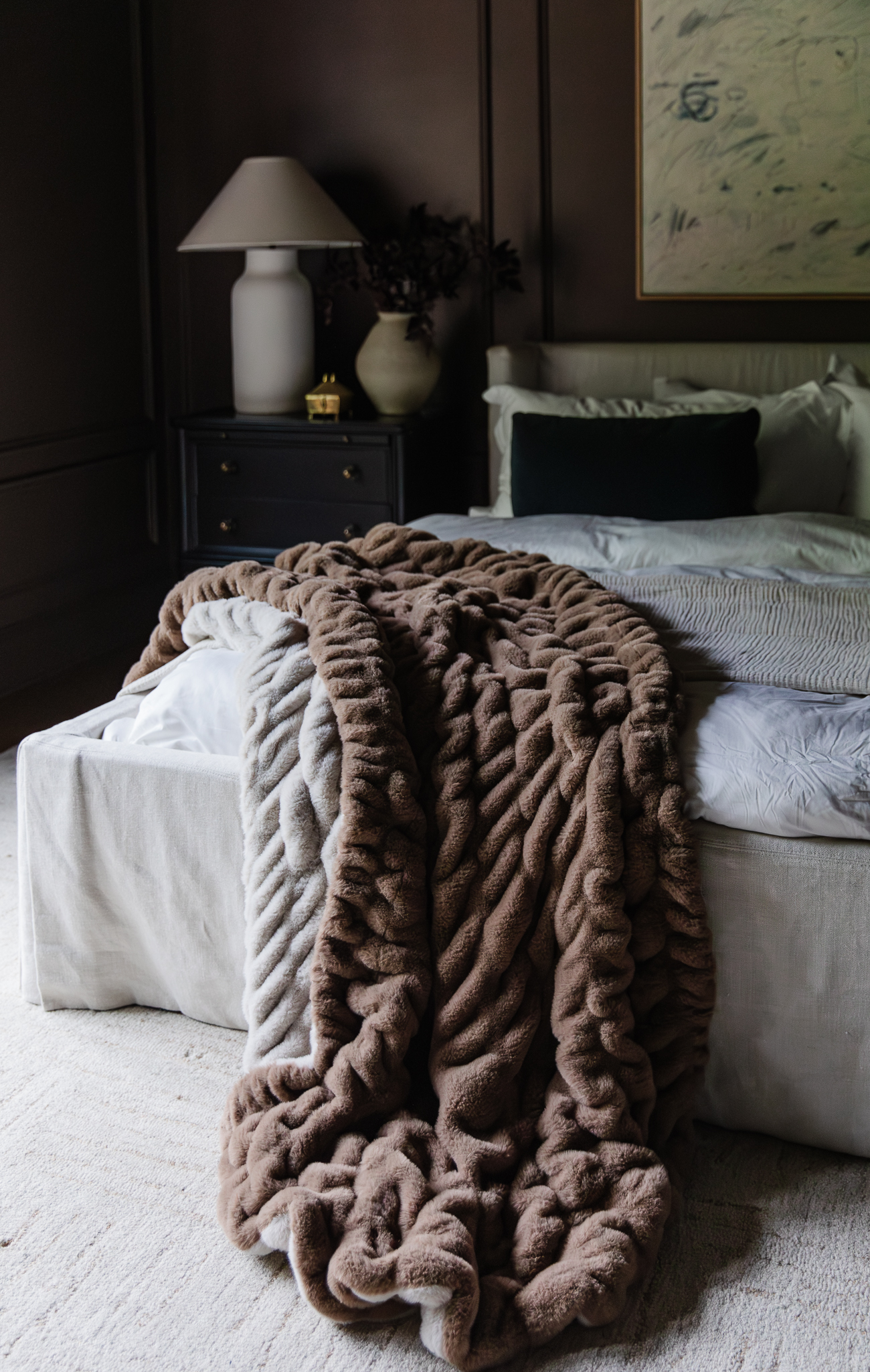 Chris Loves Julia | The new CLJ x Lola Blankets color A La Mode draped on the bed in the primary bedroom