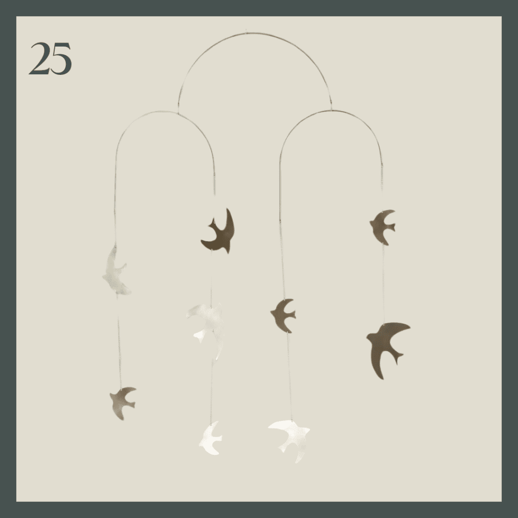 A brass and gold modern bird mobile