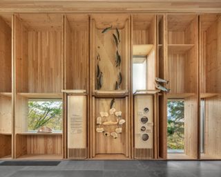 Tekαkαpimək Contact Station made of wood and among dense trees in a rural location