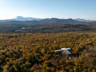 Tekαkαpimək Contact Station made of wood and among dense trees in a rural location