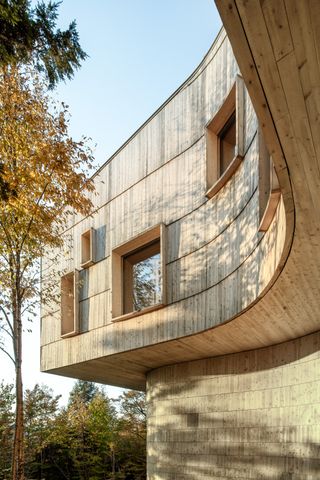 Tekαkαpimək Contact Station made of wood and among dense trees in a rural location