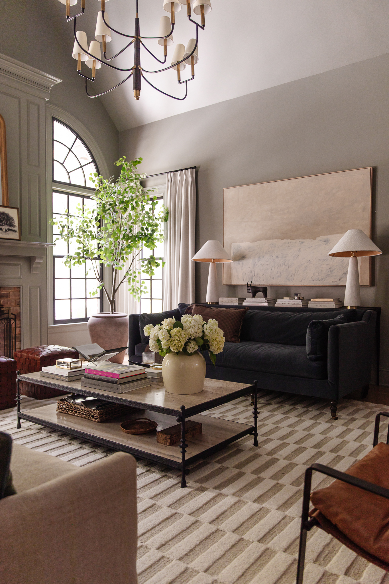 A view of the navy couch in the Modern Colonial living room