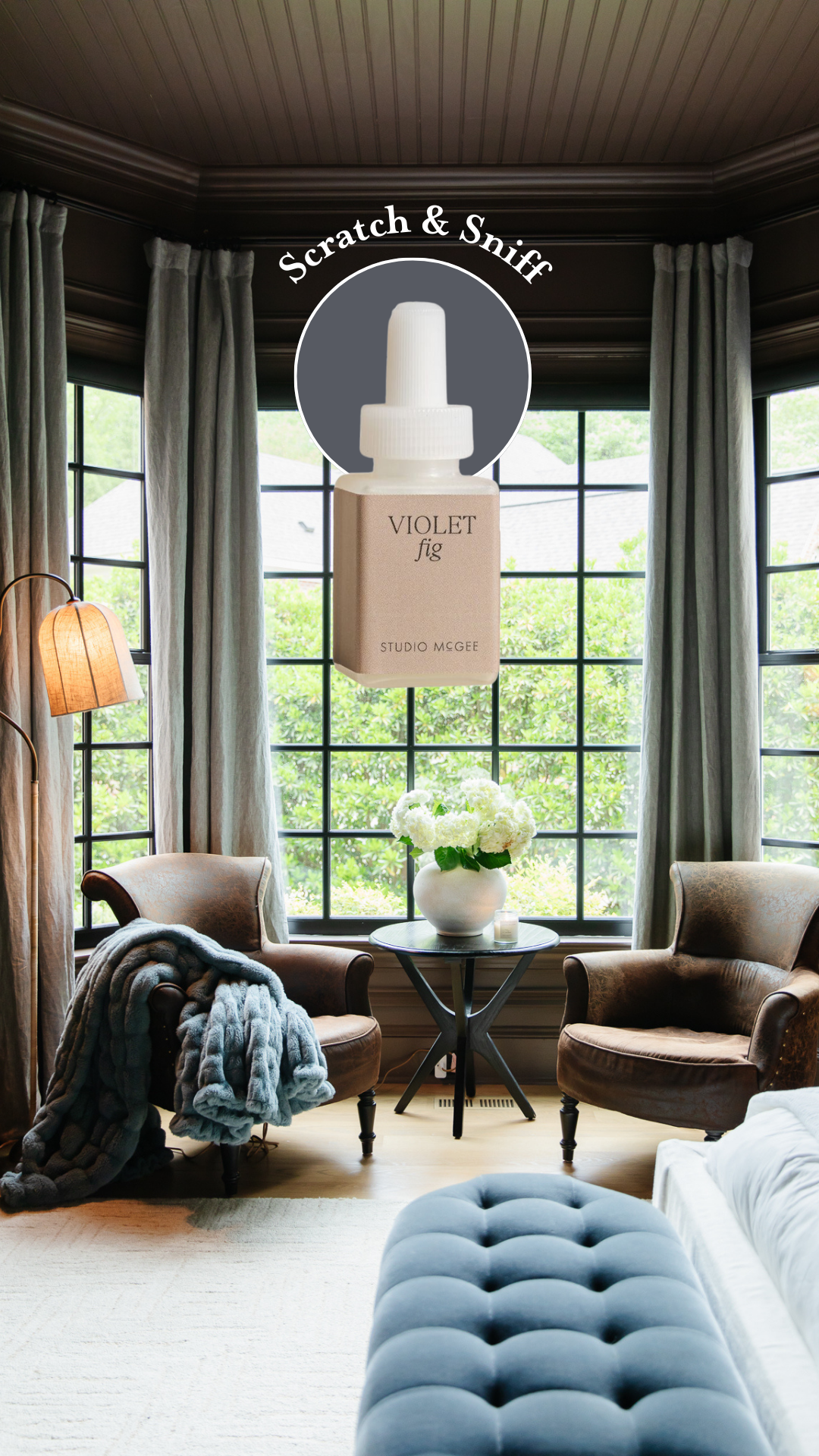 A dark, moody bedroom with a superimposed Pura fragrance bottle: Studio McGee's Violet Fig