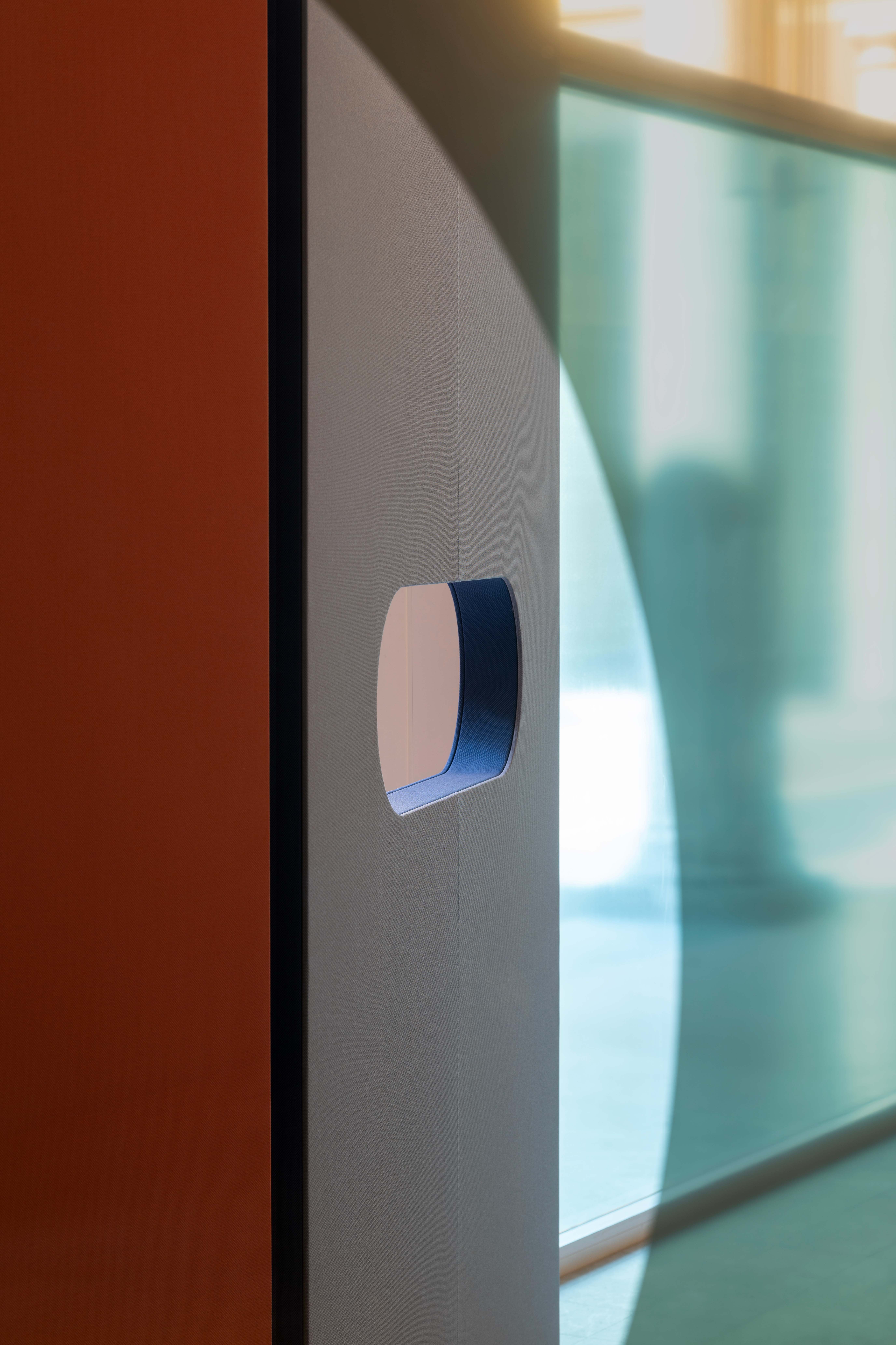 Abstract shapes and shadows made using colourful textiles and glass