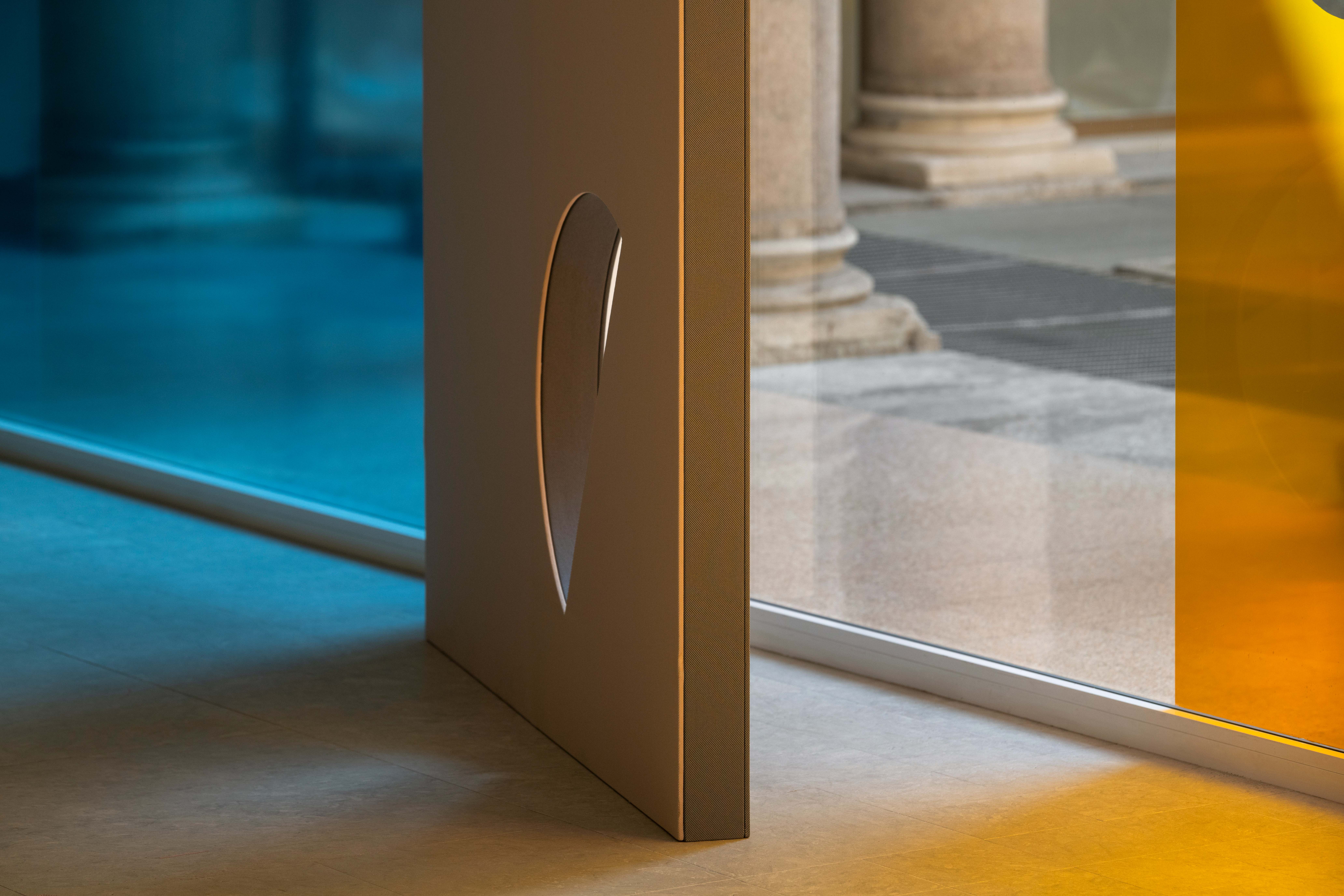 Abstract shapes and shadows made using colourful textiles and glass