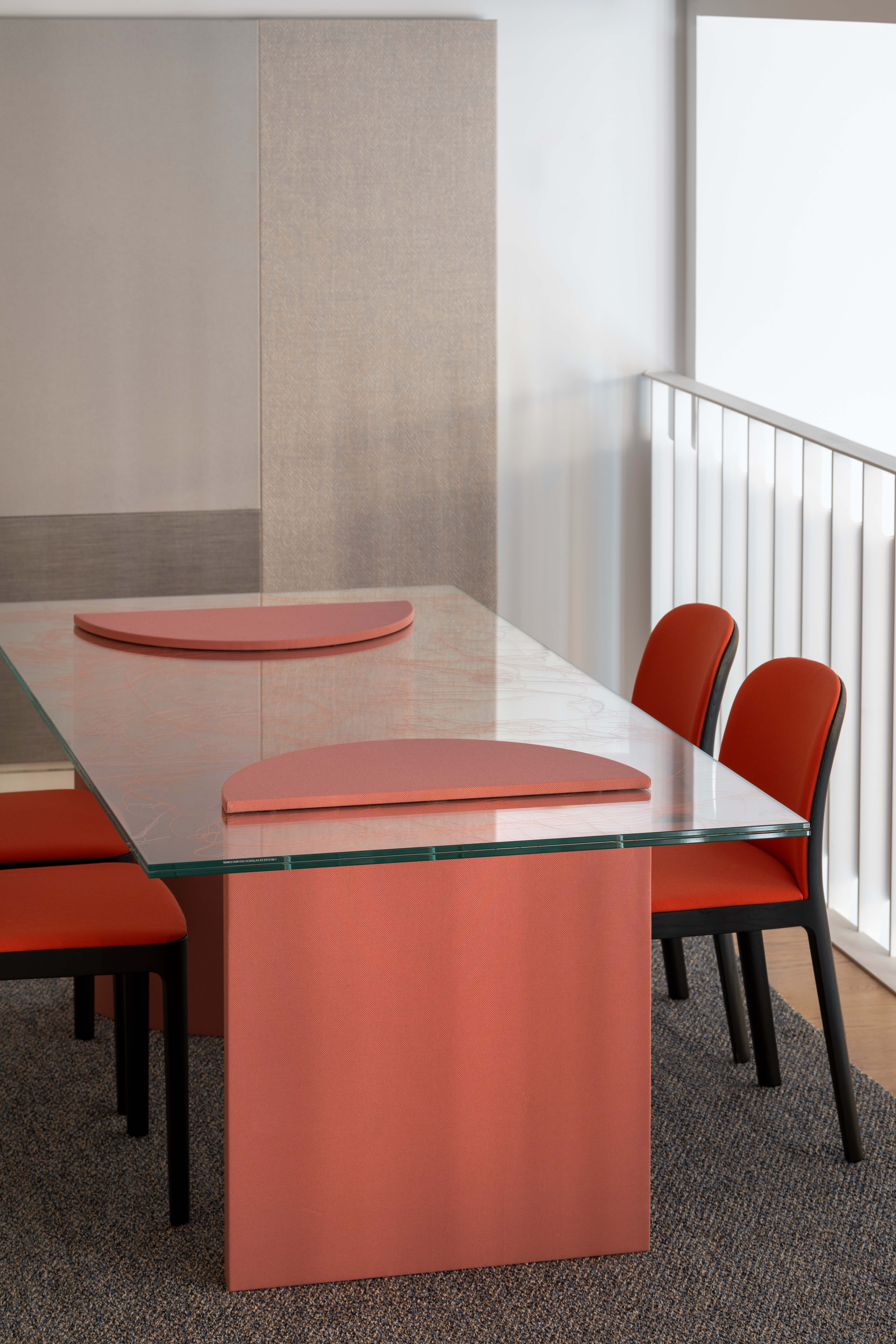 table made using colourful textiles and glass