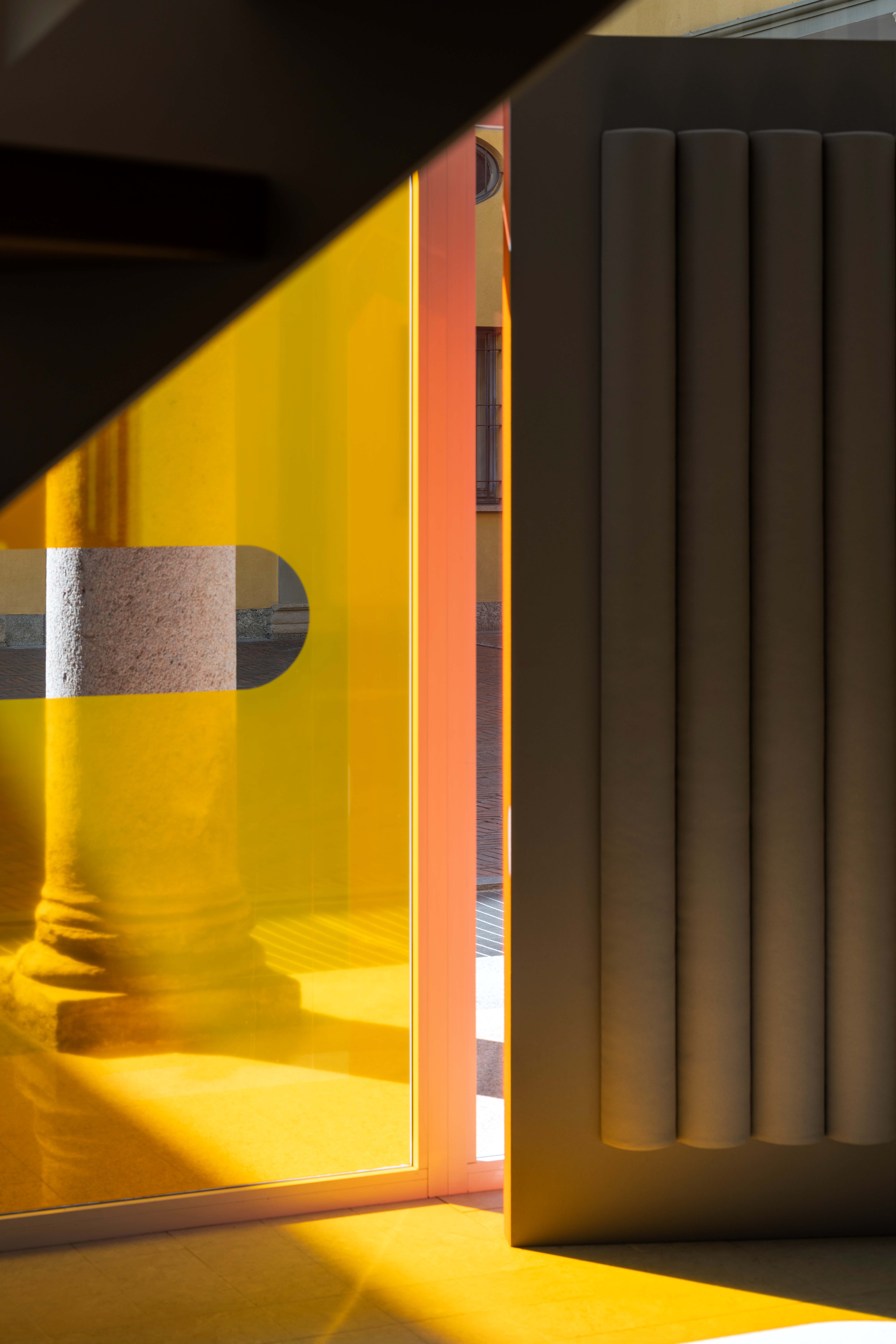 Abstract shapes and shadows made using colourful textiles and glass