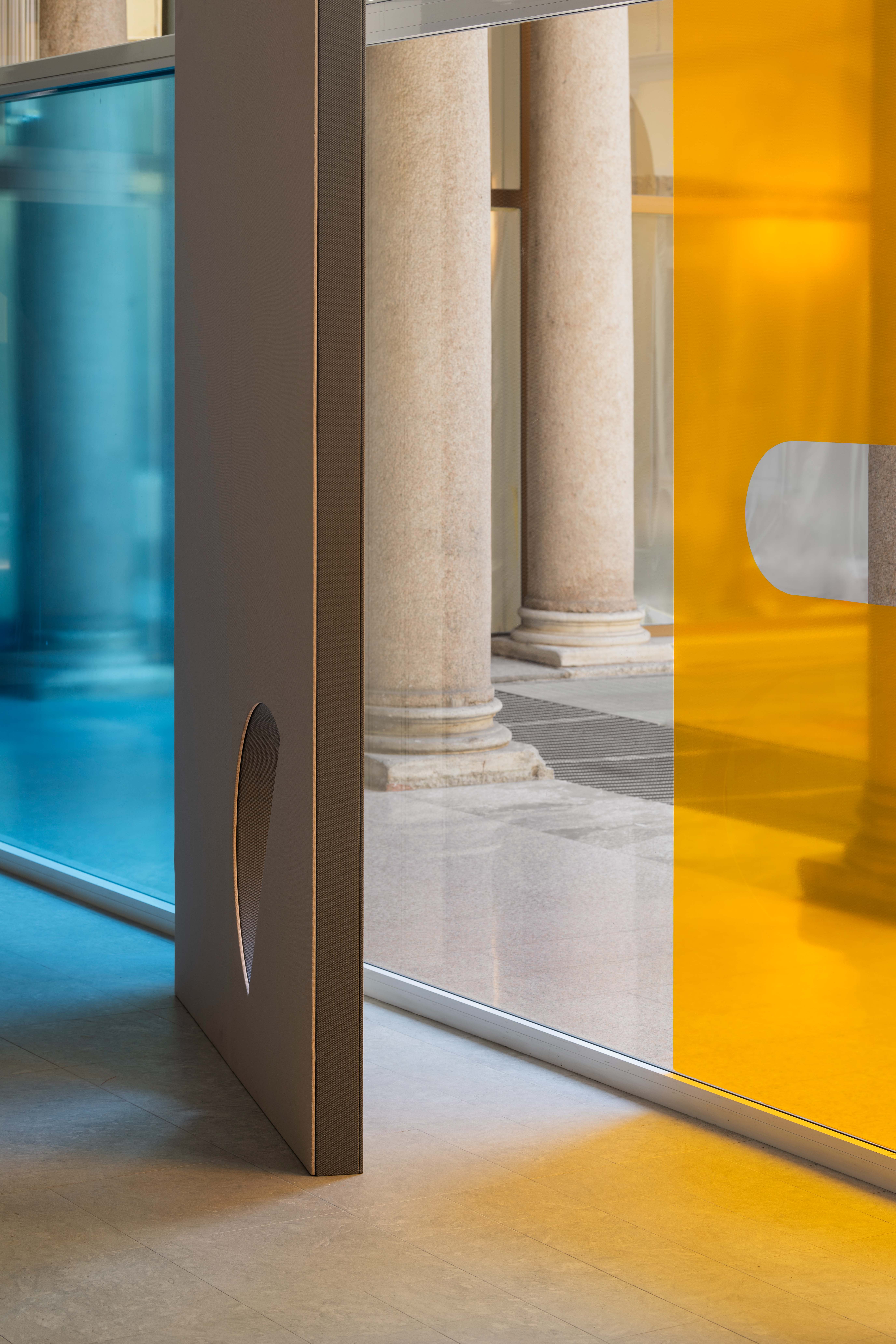 Abstract shapes and shadows made using colourful textiles and glass