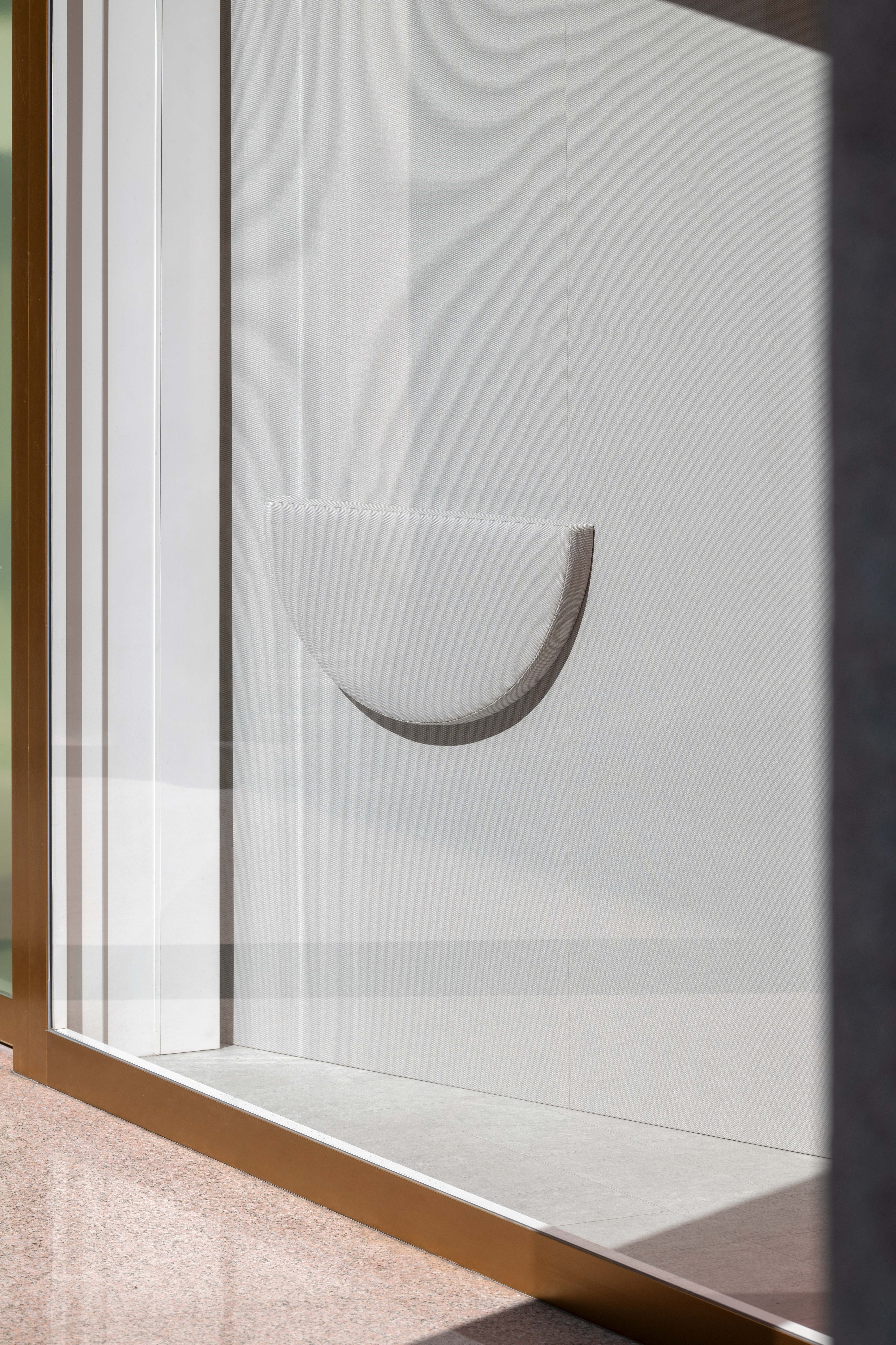 Abstract shapes and shadows made using colourful textiles and glass