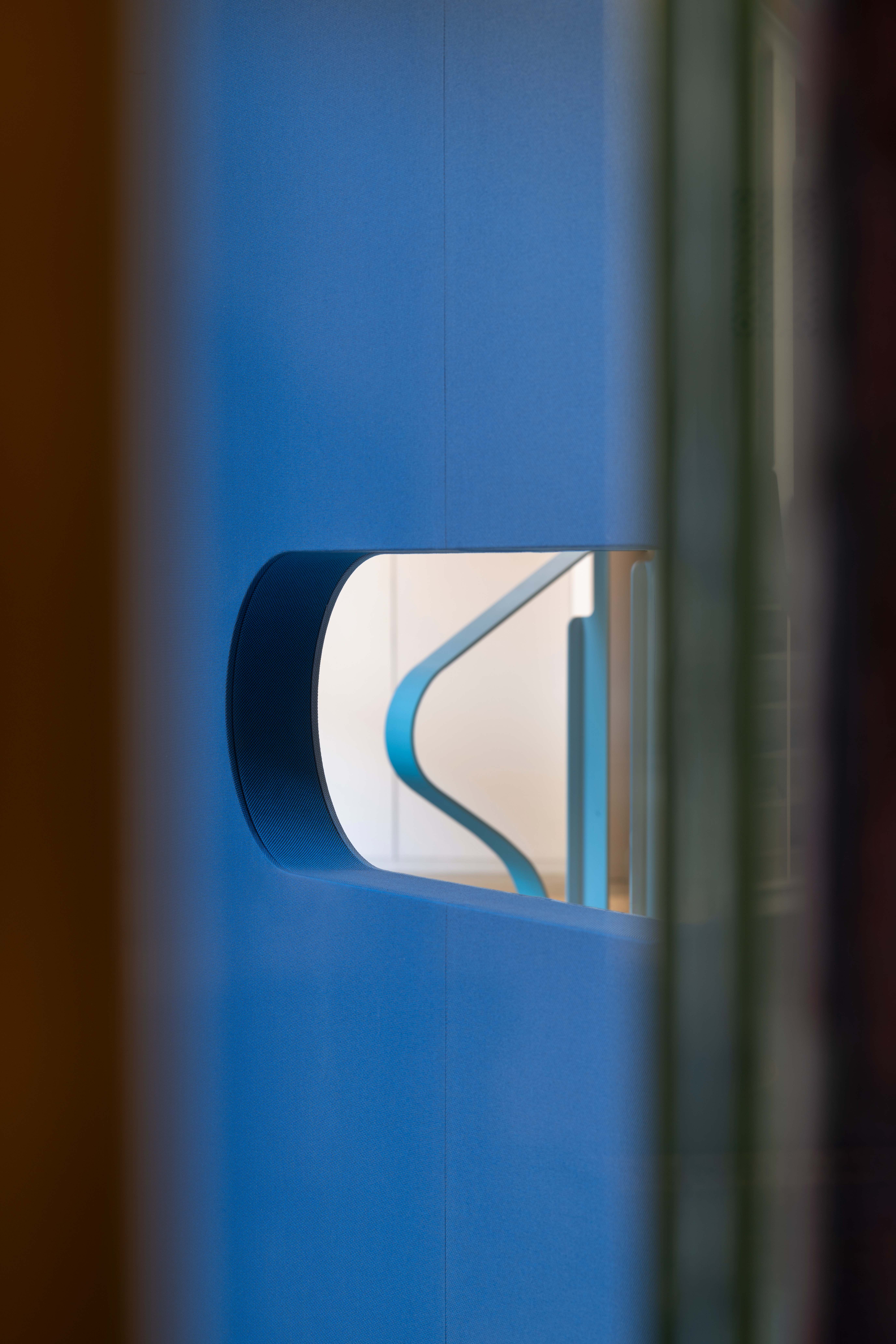 Abstract shapes and shadows made using colourful textiles and glass