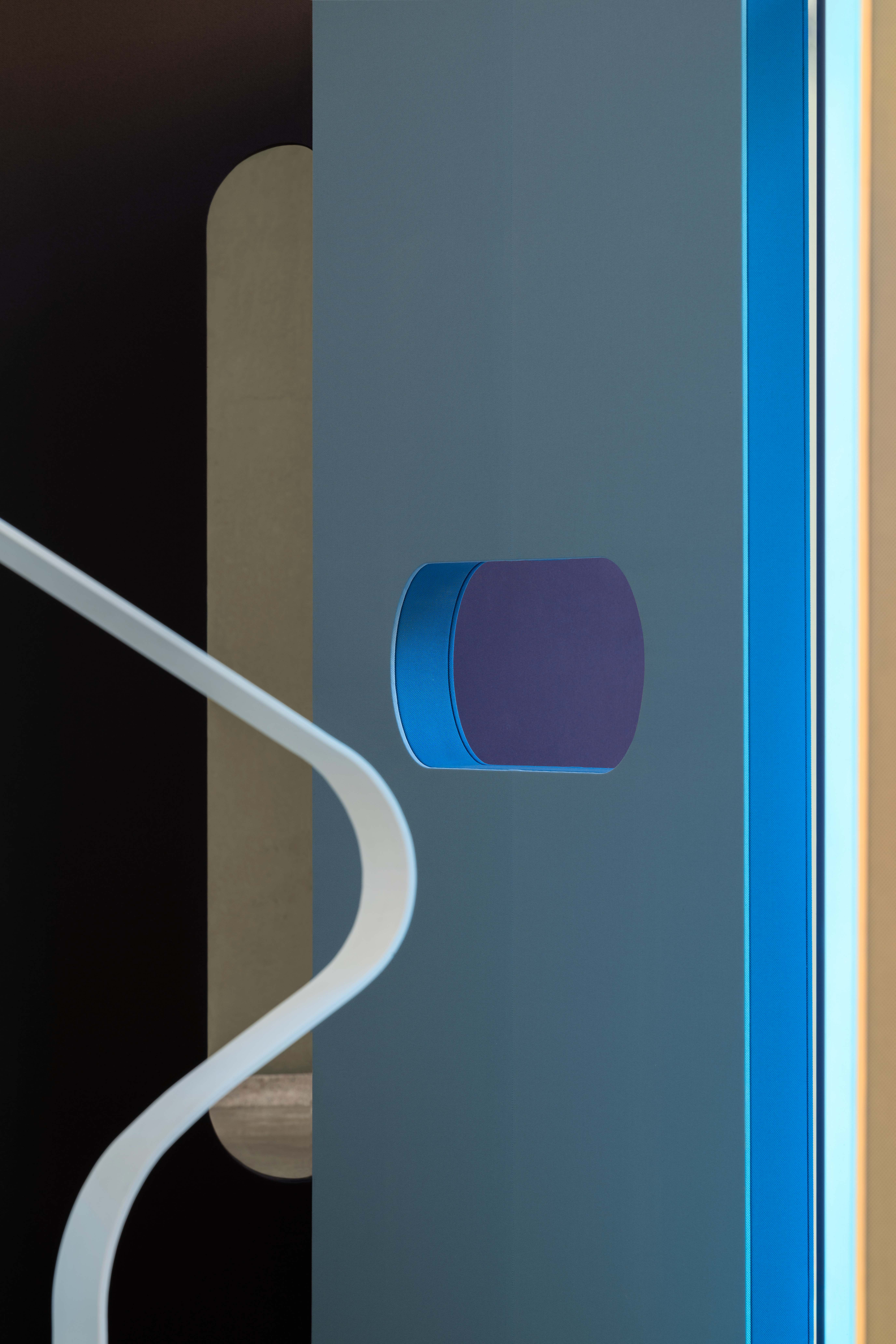 Abstract shapes and shadows made using colourful textiles and glass