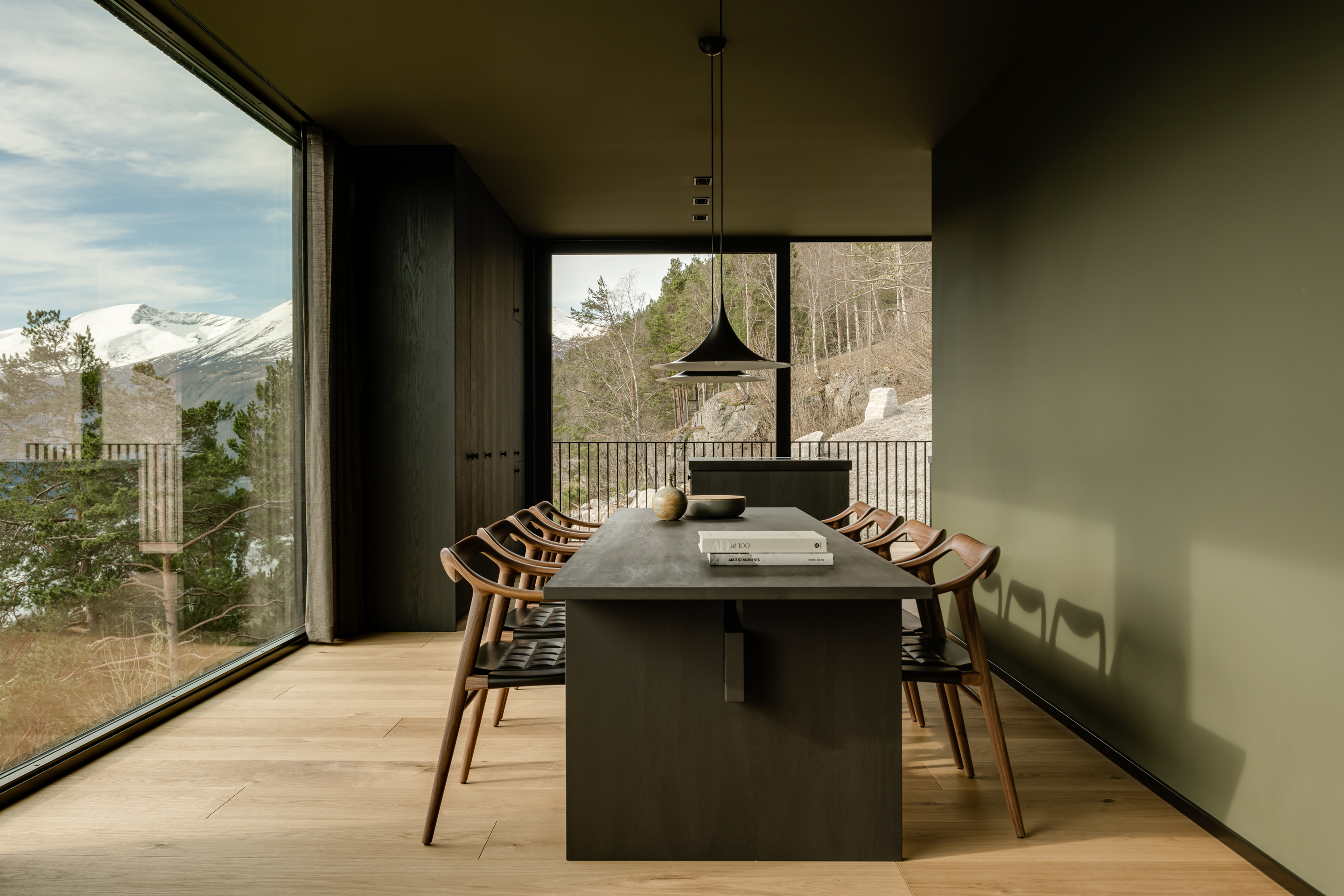 The dining space with kitchen beyond