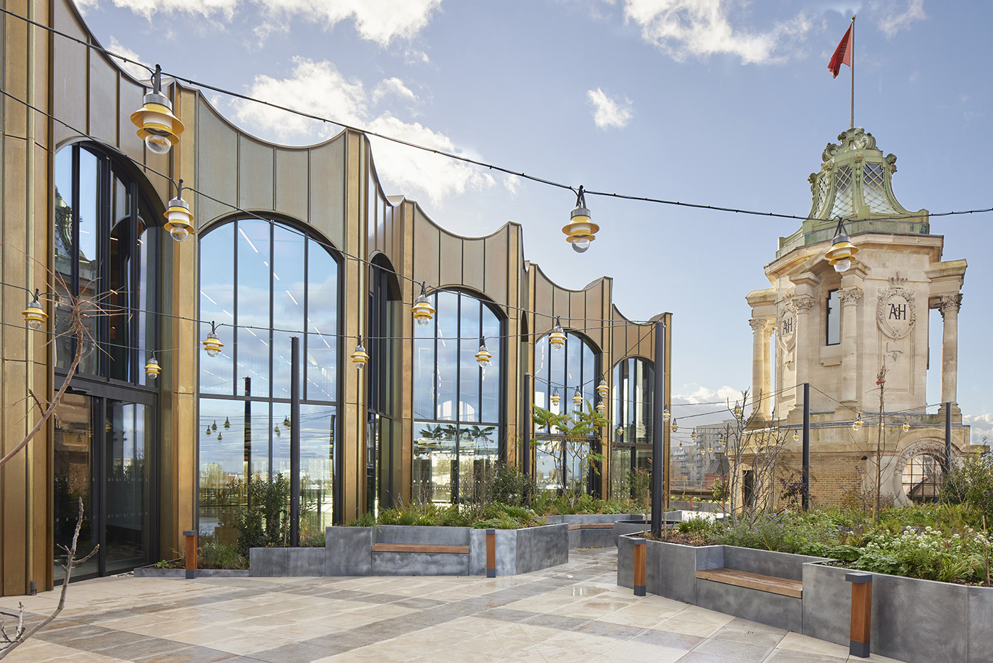 the redesigned Arding & Hobbs, one of the reborn department stores of london, showing off a new timber wrapped core and added rooftop areas