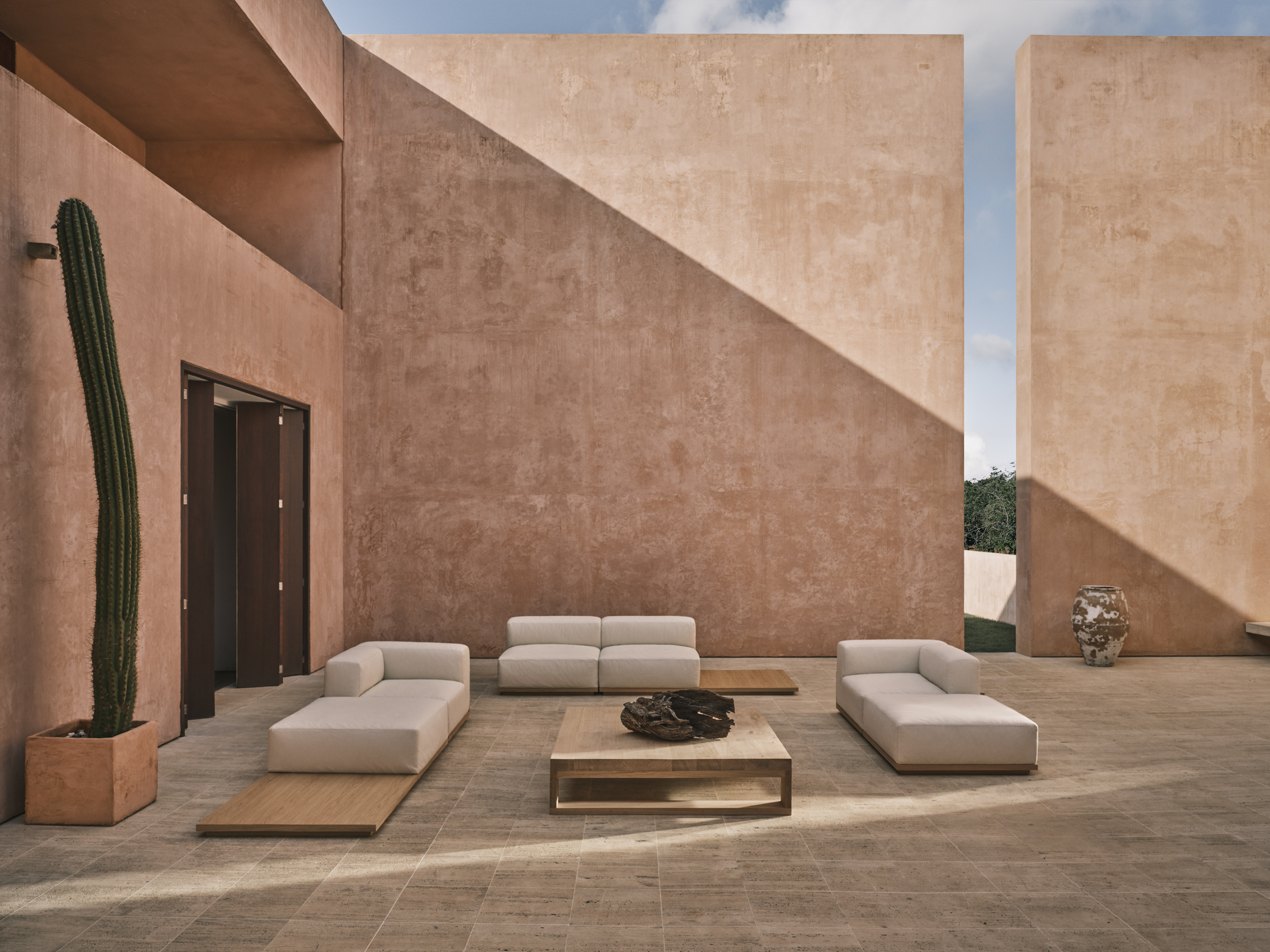 furniture arranged across minimalist interior