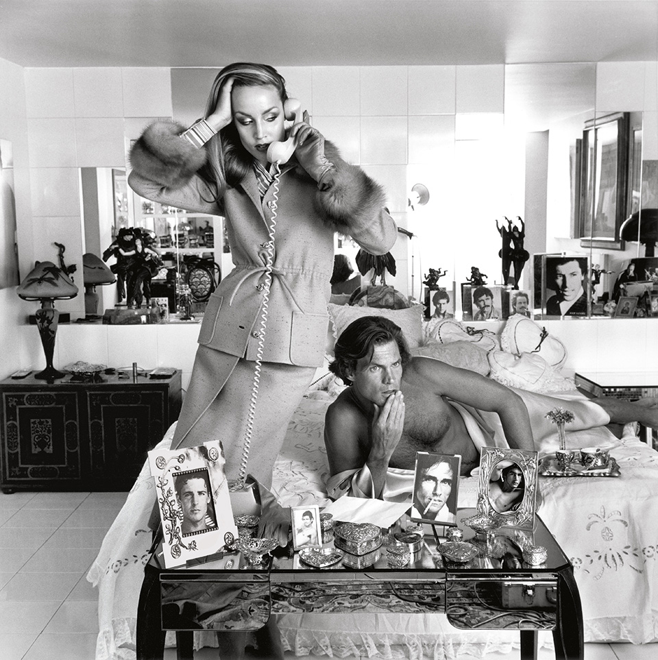 Jerry Hall in Vogue Italia September 1975 wearing Valentino (Couture. Fall-Winter 1975/76. Honey-colored wool suit with sable-edged collar and cuffs and drawstring waist. The skirt is straight; the patterned silk blouse is in shades of honey and hazelnut.)