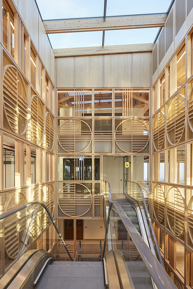 the redesigned Arding & Hobbs, one of the reborn department stores of london, showing off a new timber wrapped core and added rooftop areas