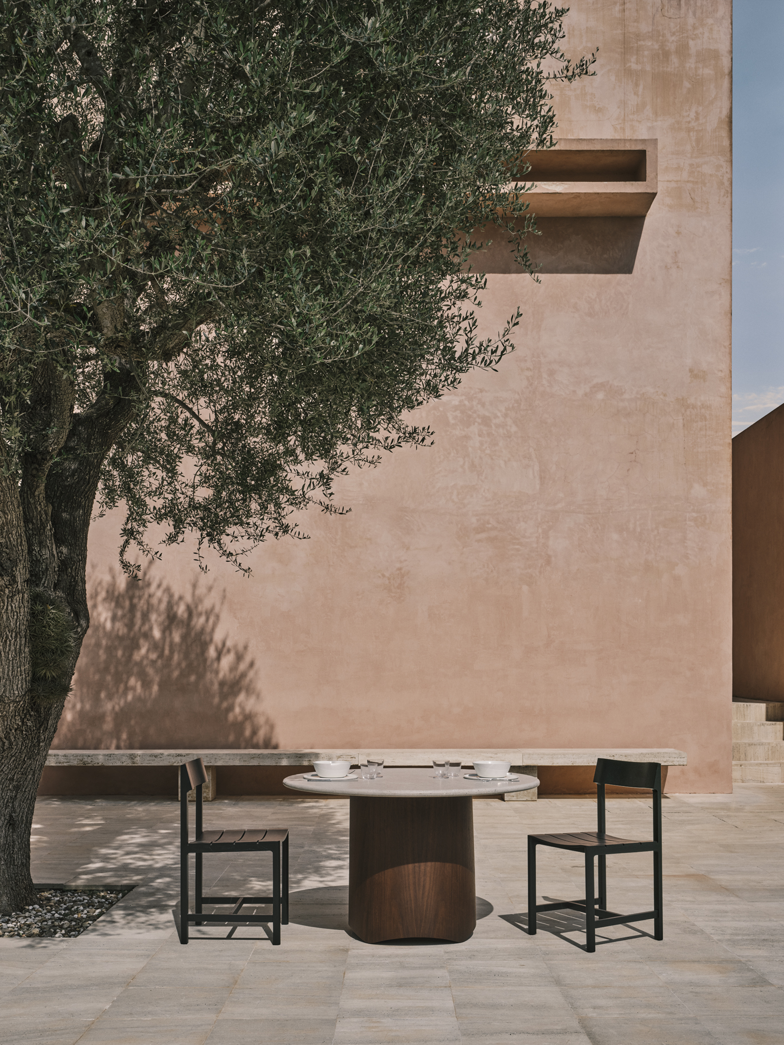 furniture arranged across minimalist interior