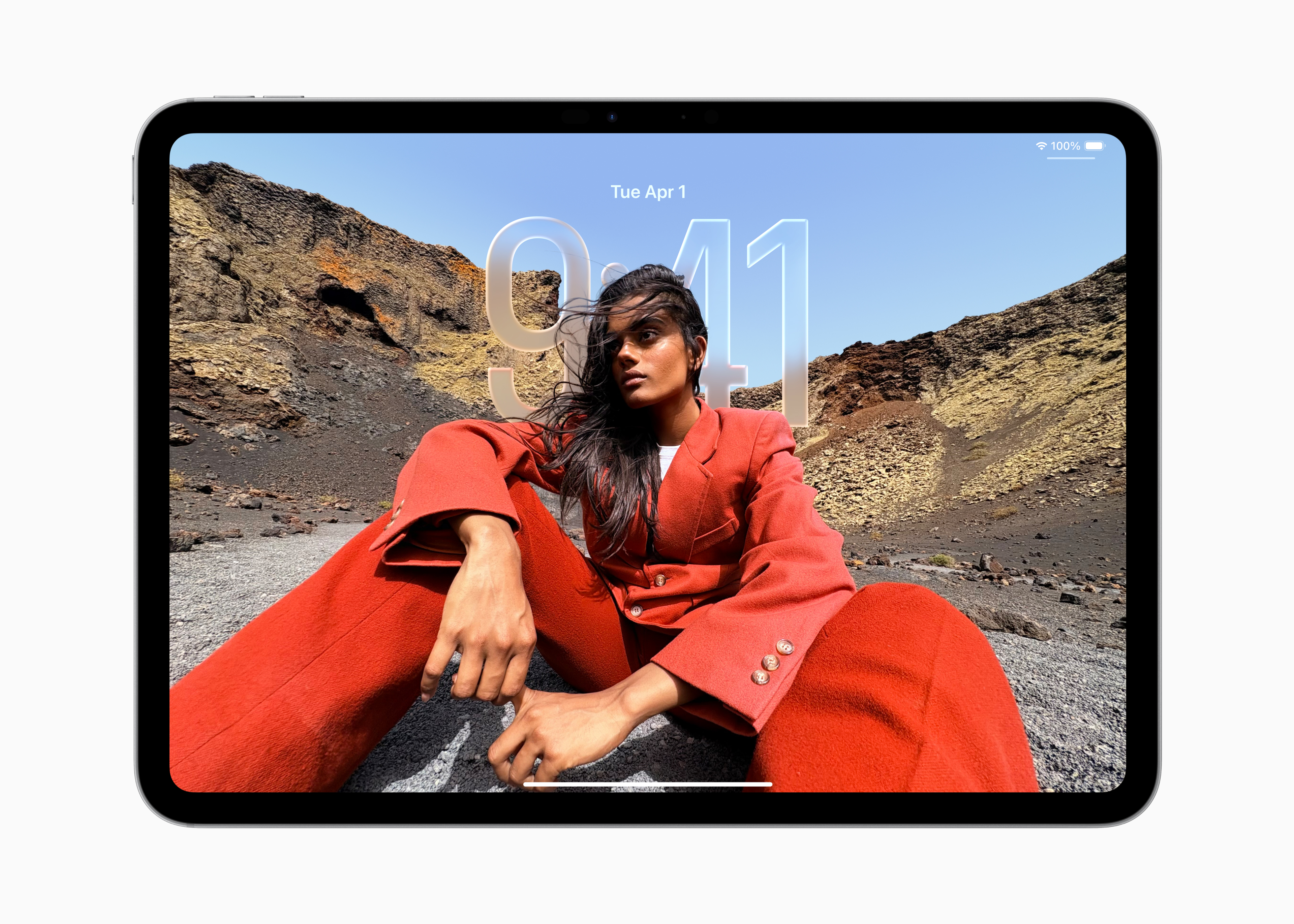 iPadOS 26 showing the dynamic clock placement on the lock screen