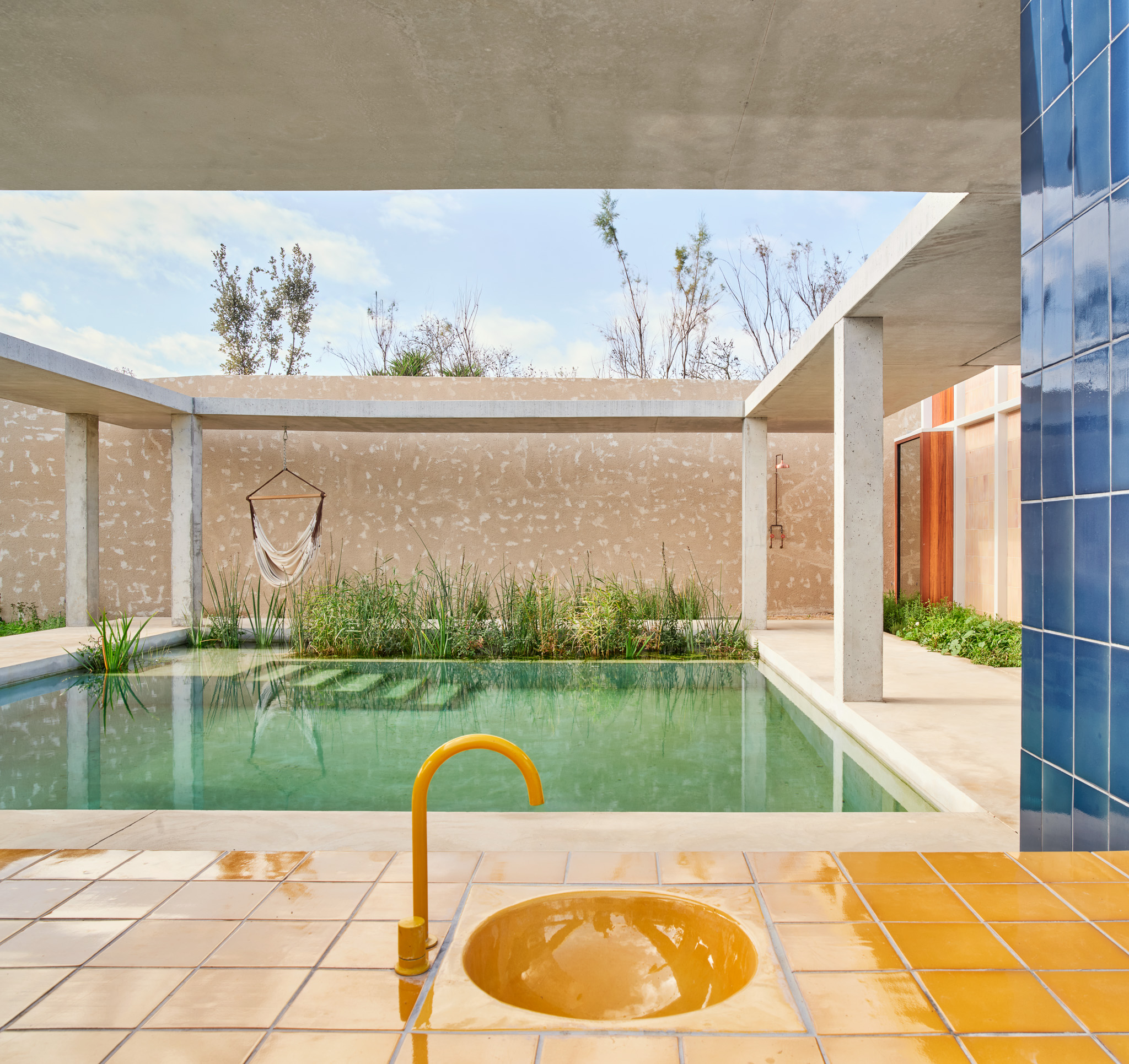 The entire plot is surrounded by rough finished walls