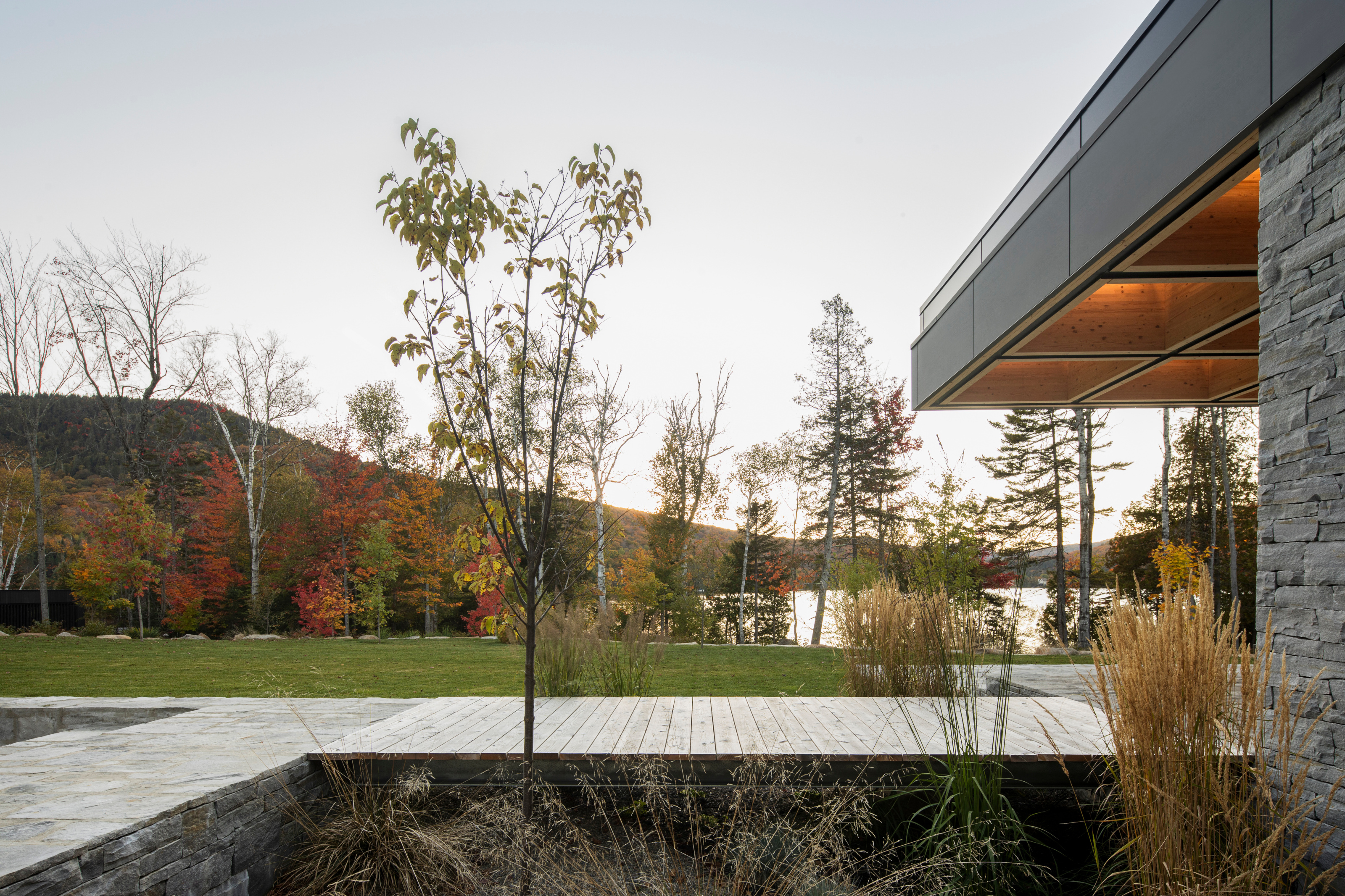 The stone walls are continued out into the landscape