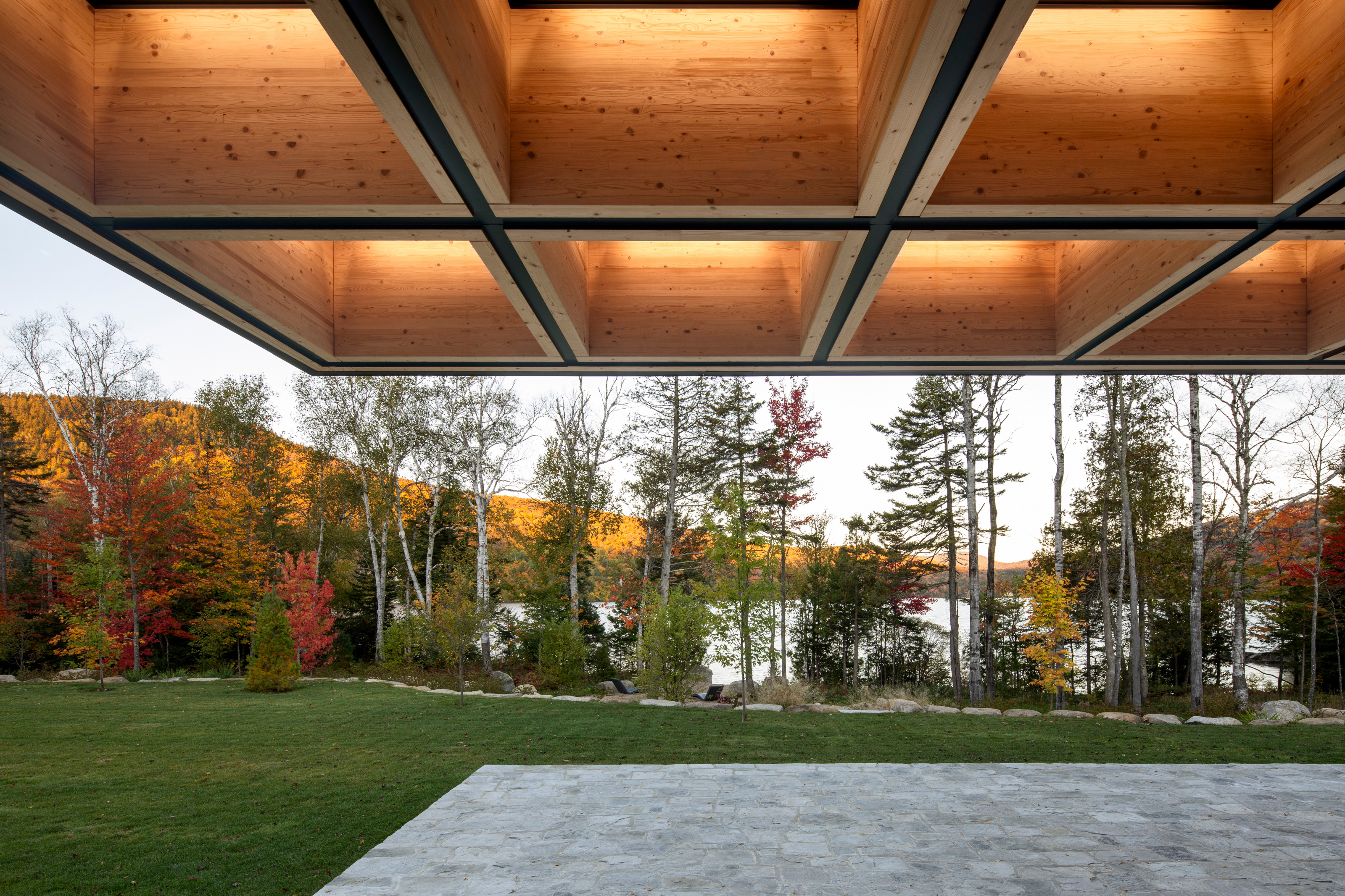 The roof also serves to frame views of the lake