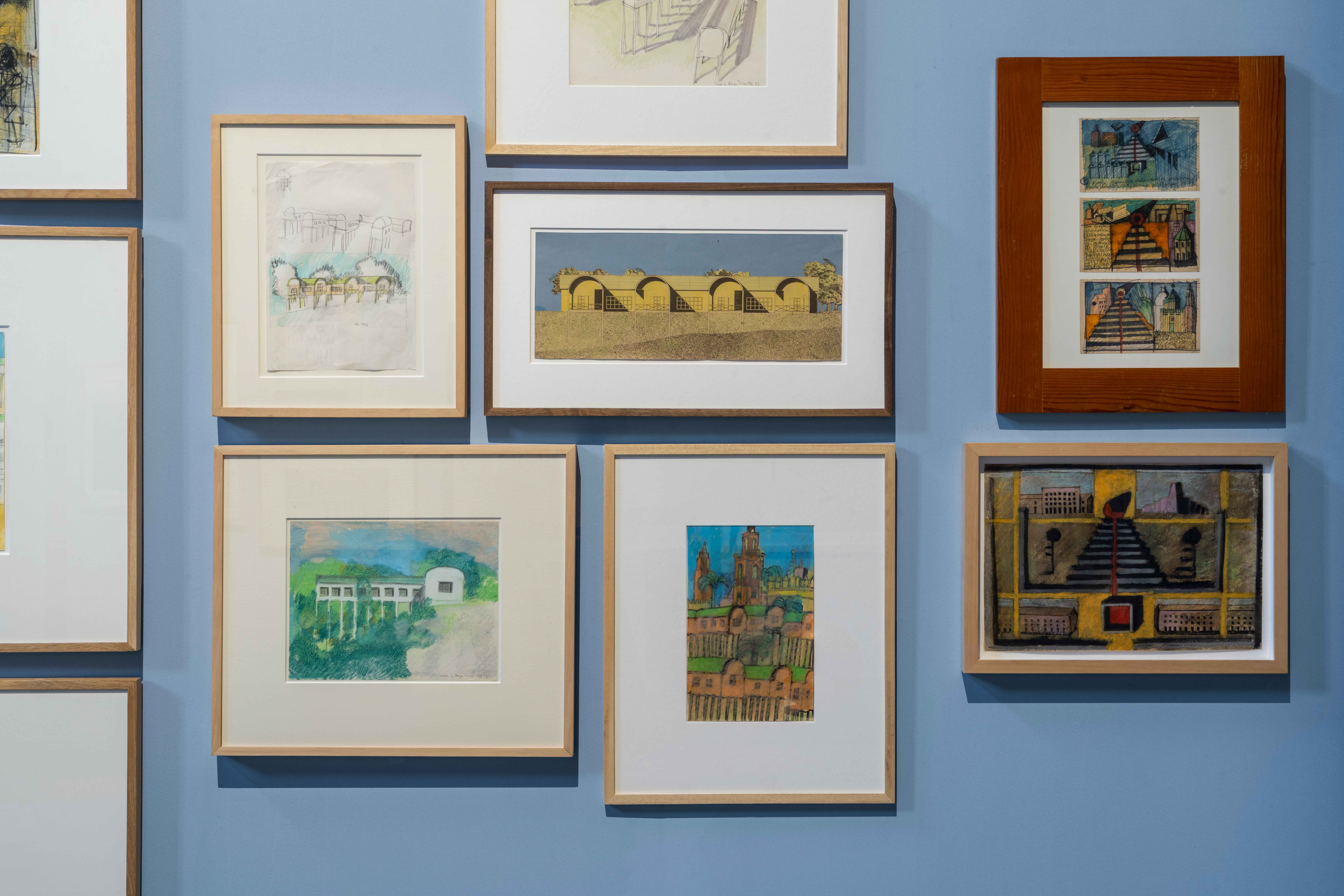 Antique Italian church with blue partitions to show framed drawings by architect Aldo Rossi