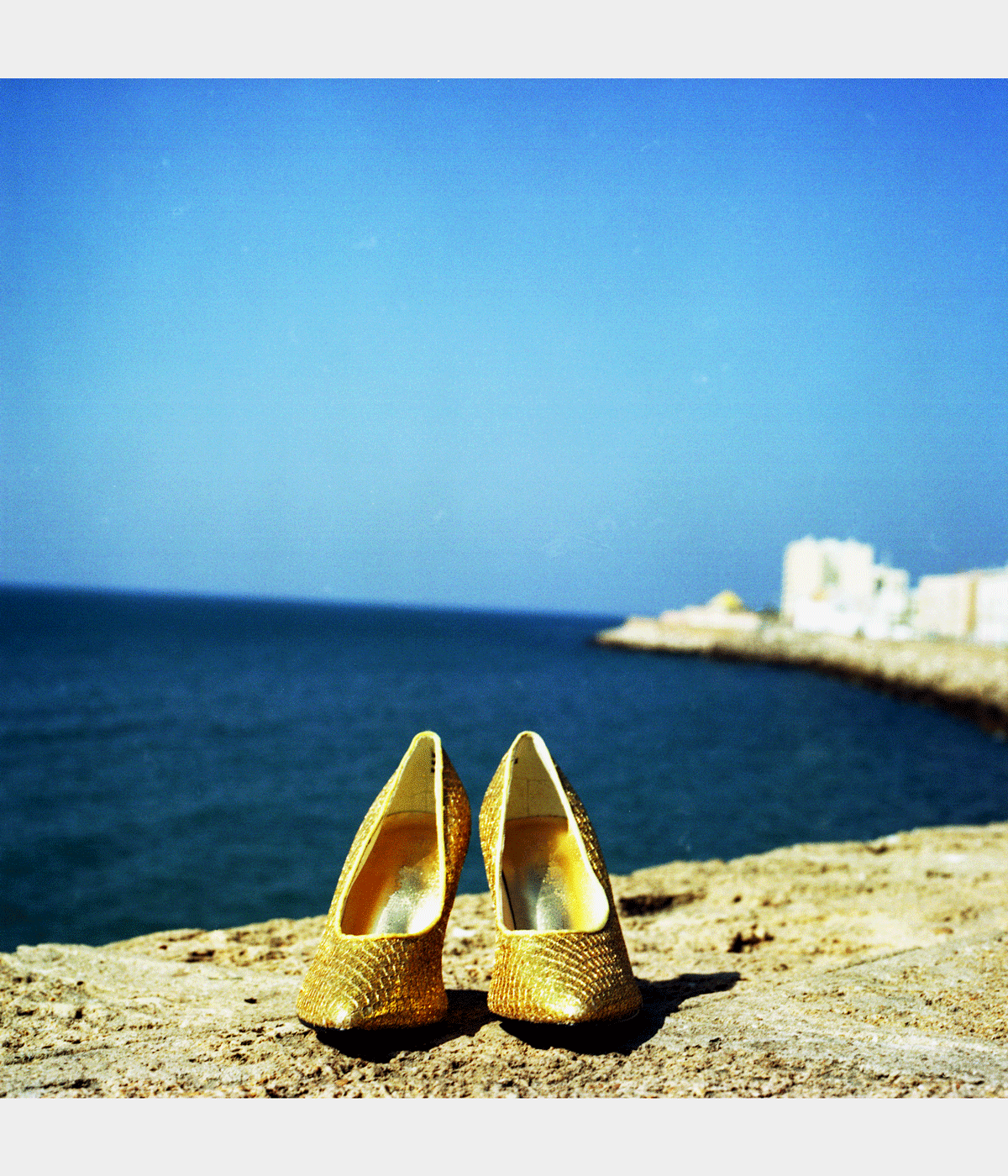 photographs of gold shoes