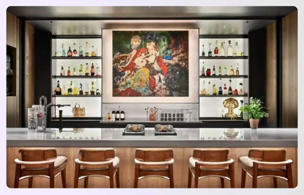 Large statement artwork behind a home bar