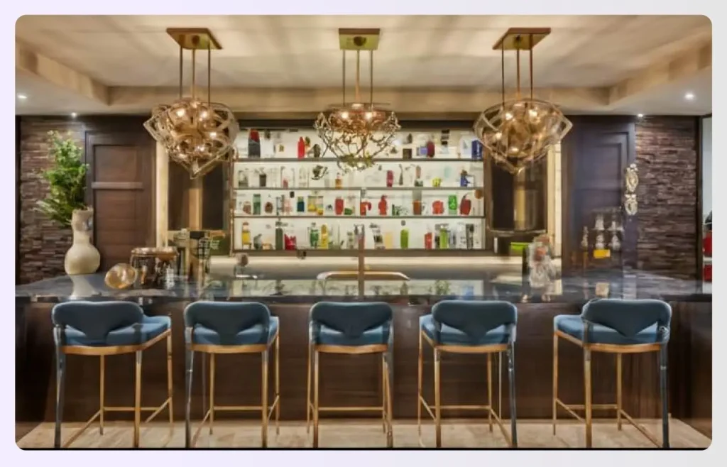 Sculptural pendant lights over a modern home bar 