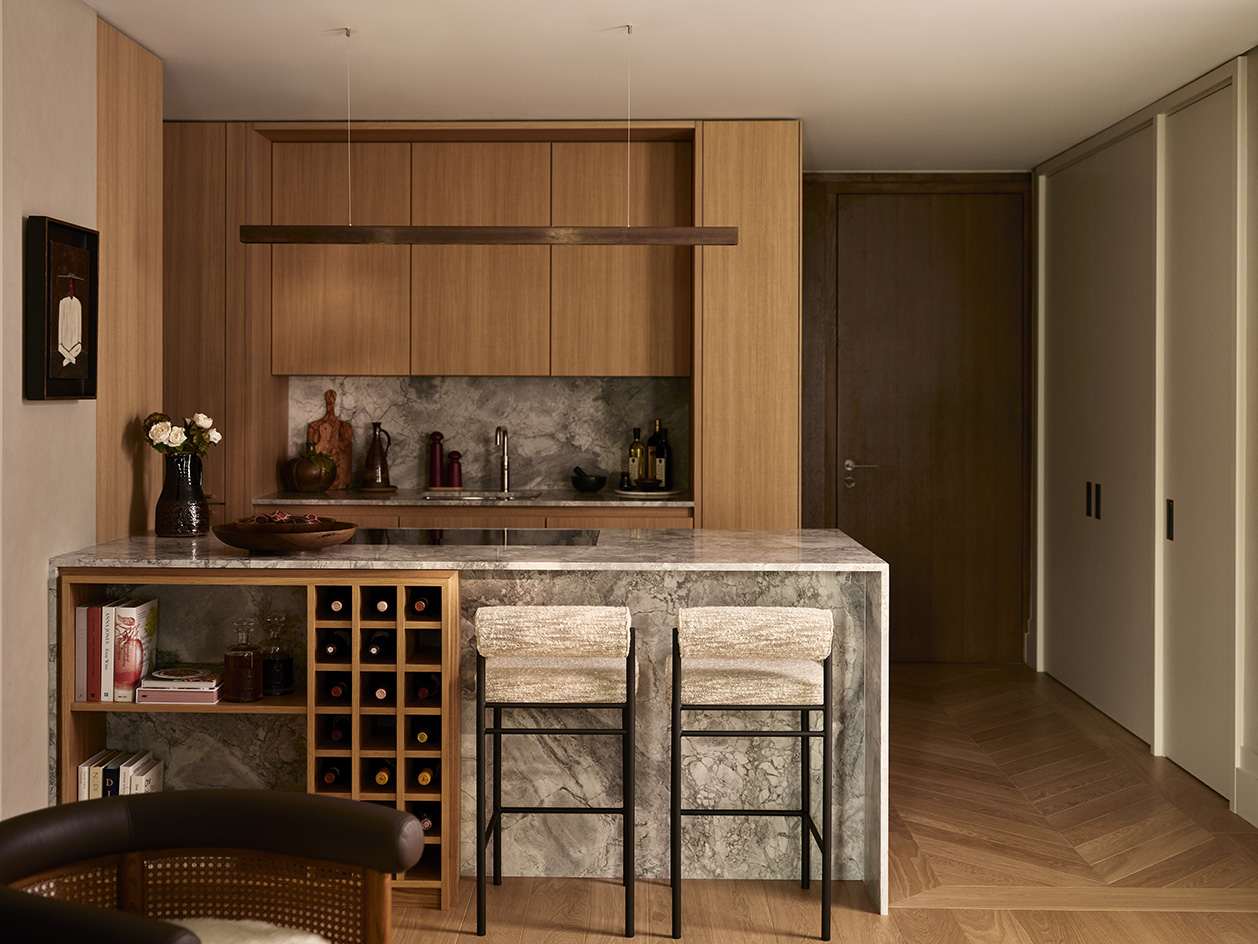 interiors of home in 100 George Street, warm, brown tones and fabrics