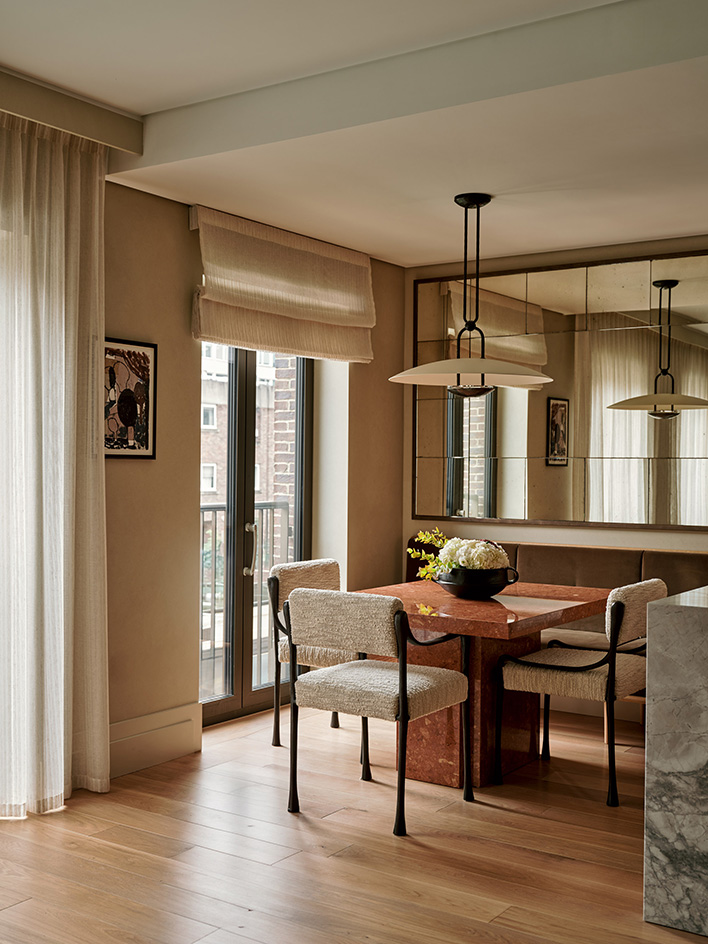 interiors of home in 100 George Street, warm, brown tones and fabrics