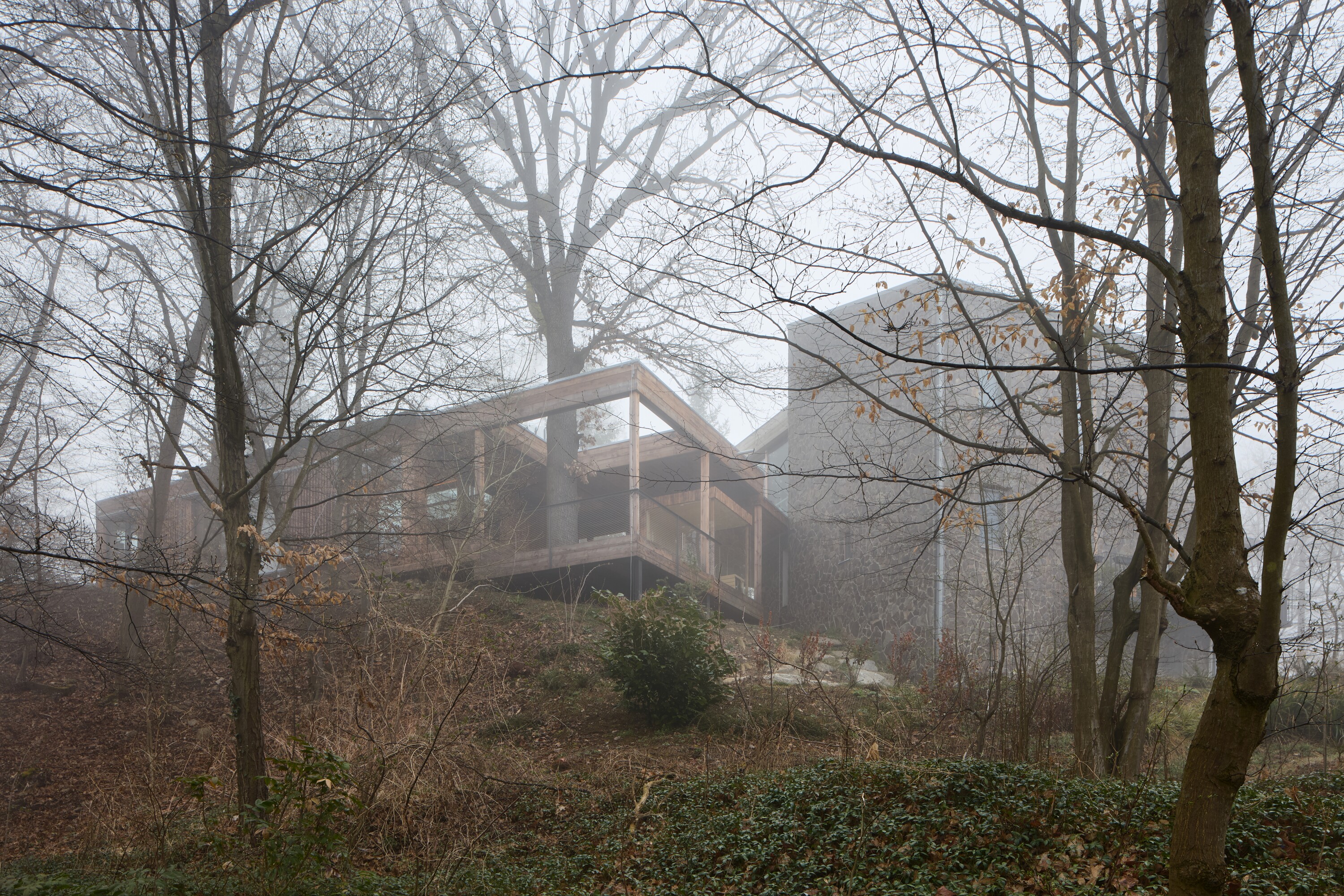 The new studio and existing house seen from down in the valley