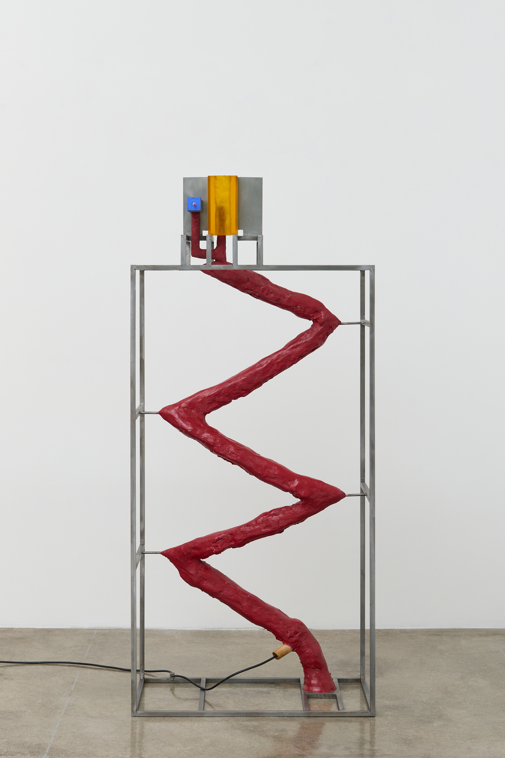 Light sculpture by David Lynch comprising a red zig-zag within a metal framework