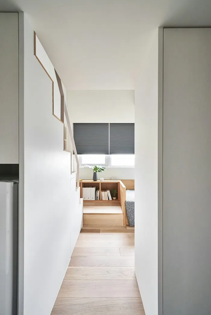 Small studio apartment corridor with built-in wardrobes