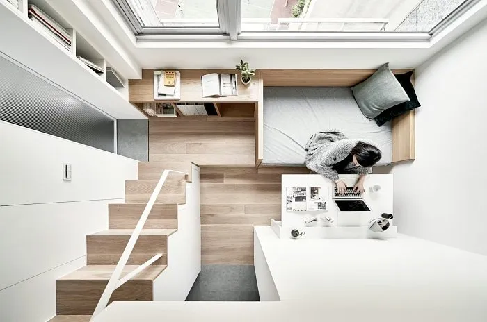 Small studio apartment overall layout with mezzanine and open-plan design