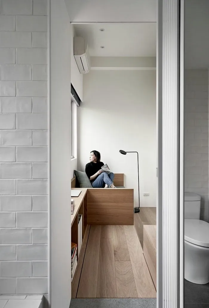 Studio apartment hallway layout connecting living and bathroom areas