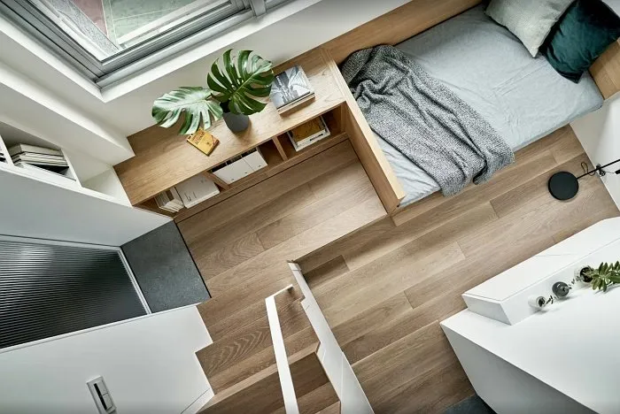 Very small studio apartment vertical layout with smart space-saving design