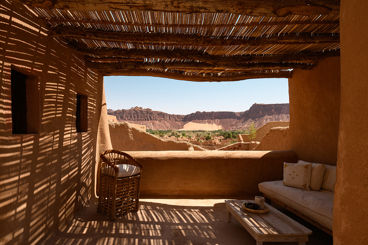 views of mud brick house with warm hues in desert building style, Bin Nouh's Courtyard House by Shahira Fahmy