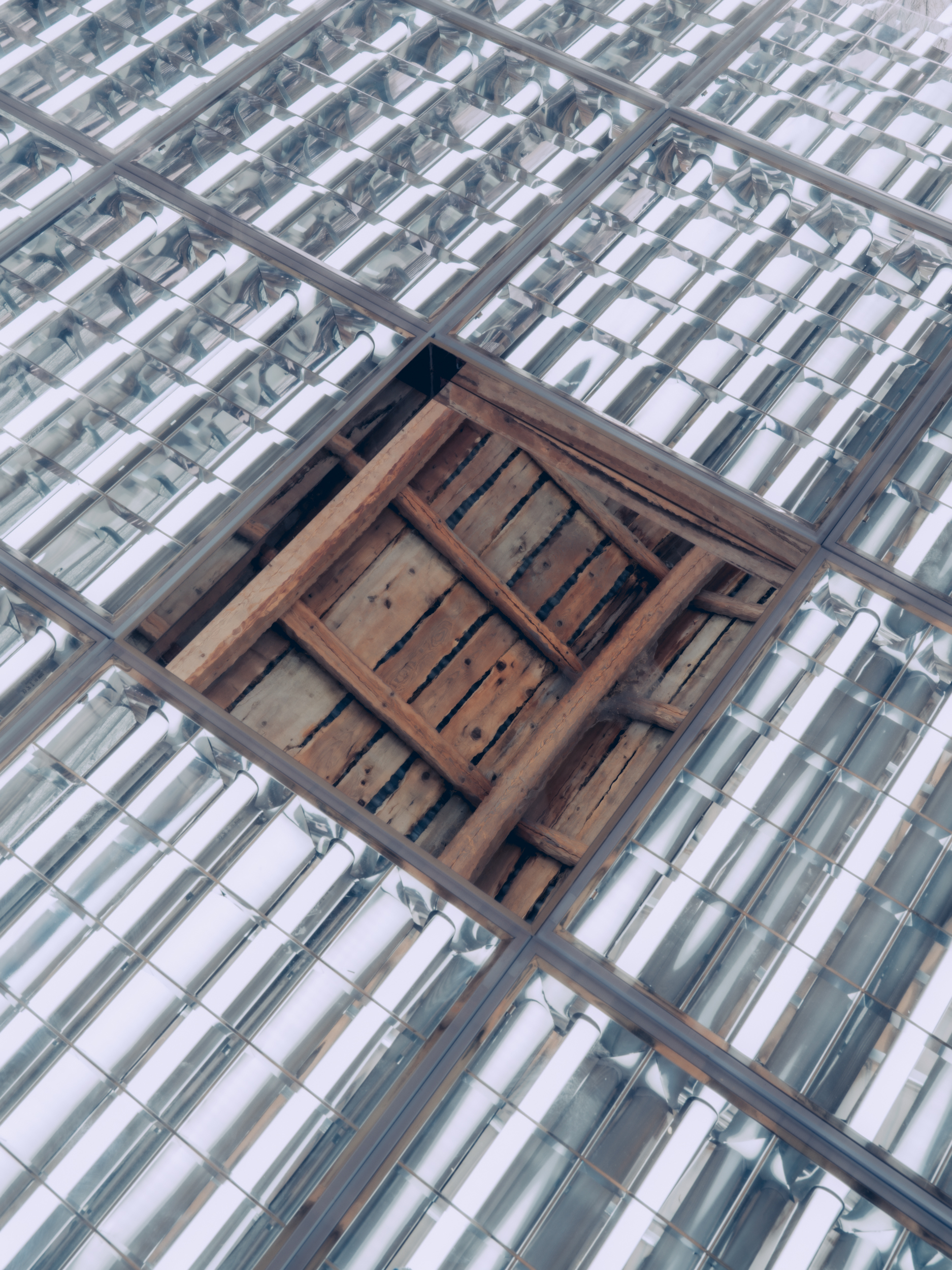 light panels installed inside a Swiss barn by Alexandre de Betak