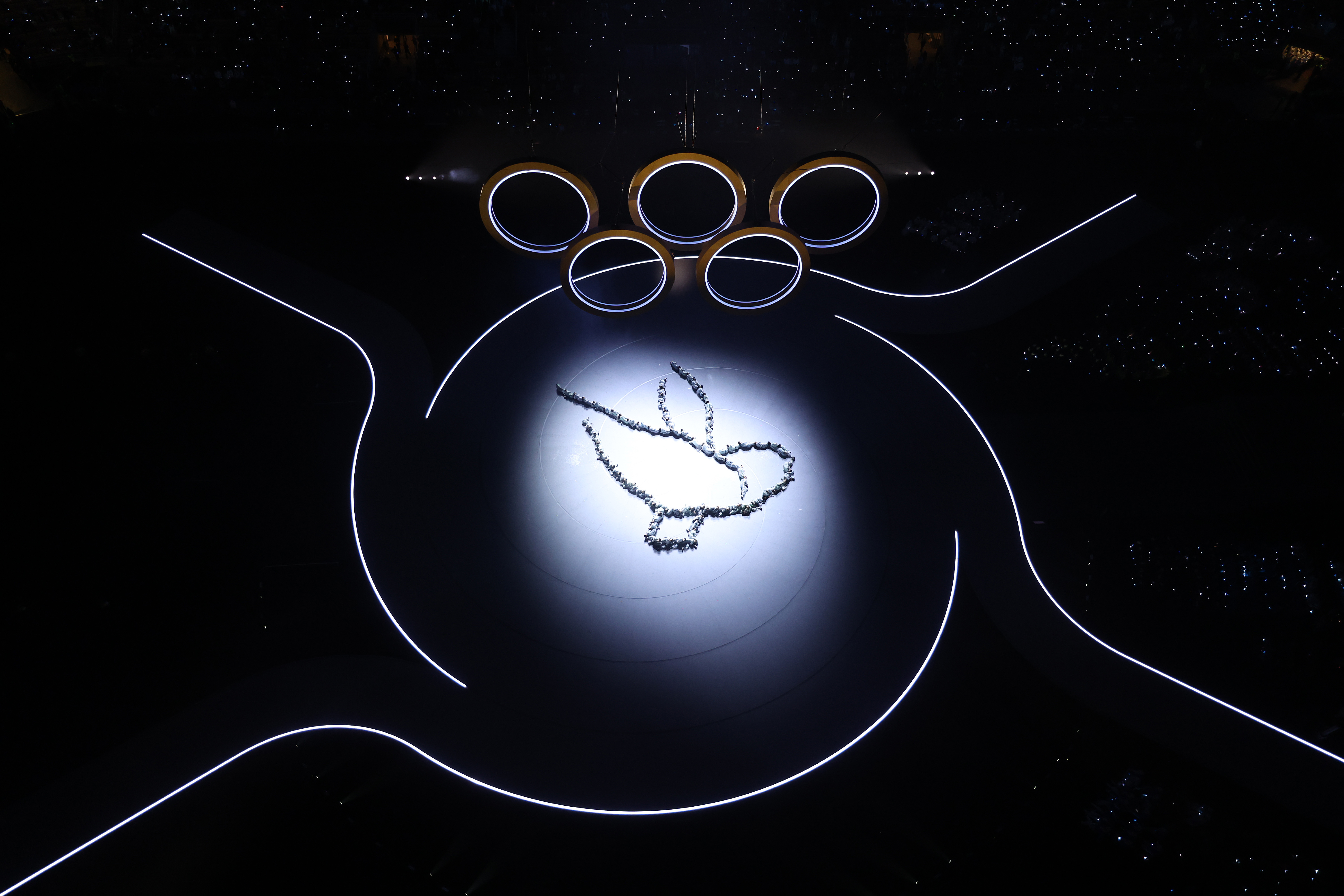 Ghali on stage at the Winter Olympics opening ceremony