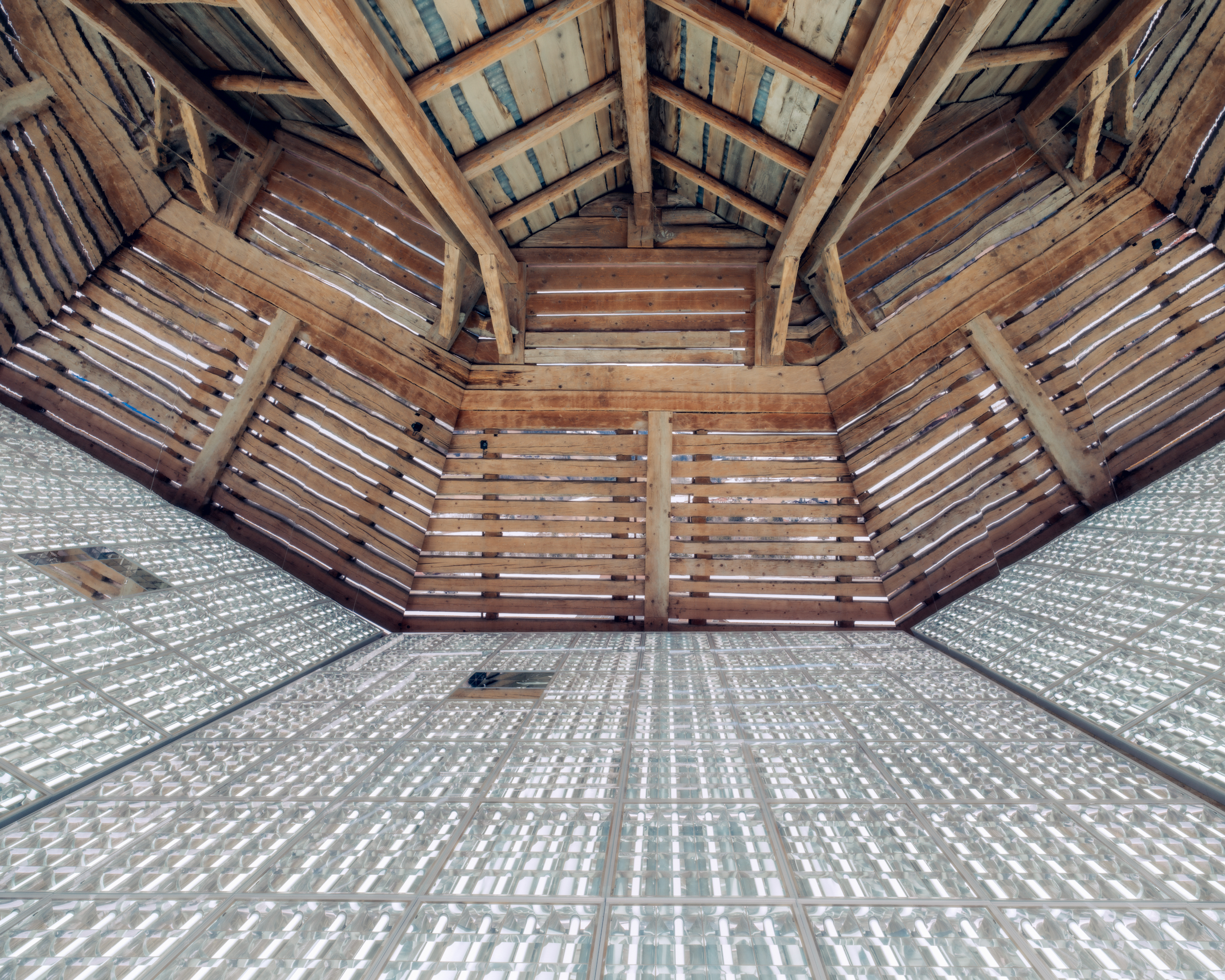 light panels installed inside a Swiss barn by Alexandre de Betak