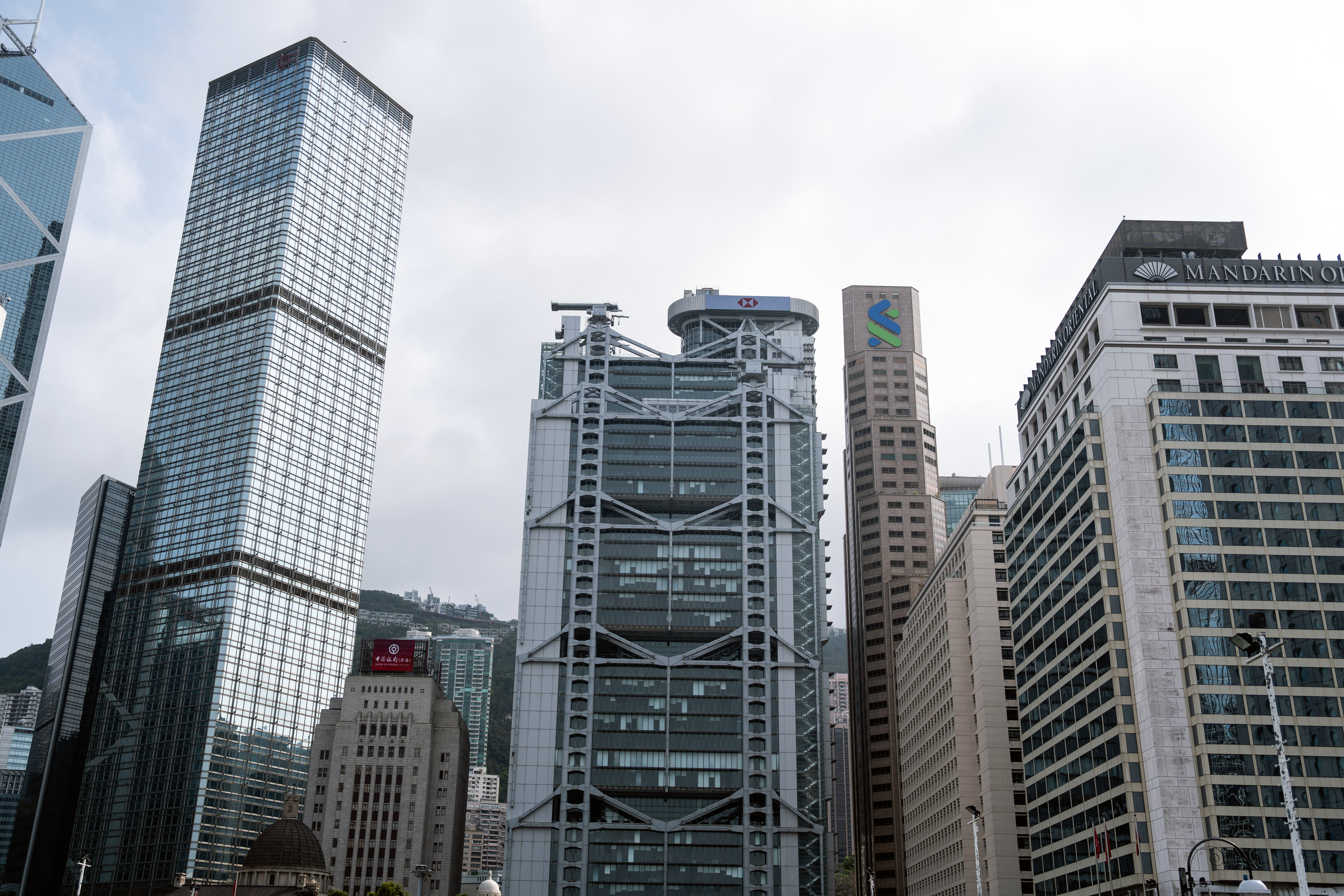 The HSBC Holdings Plc headquarters building, center, in Hong Kong, China