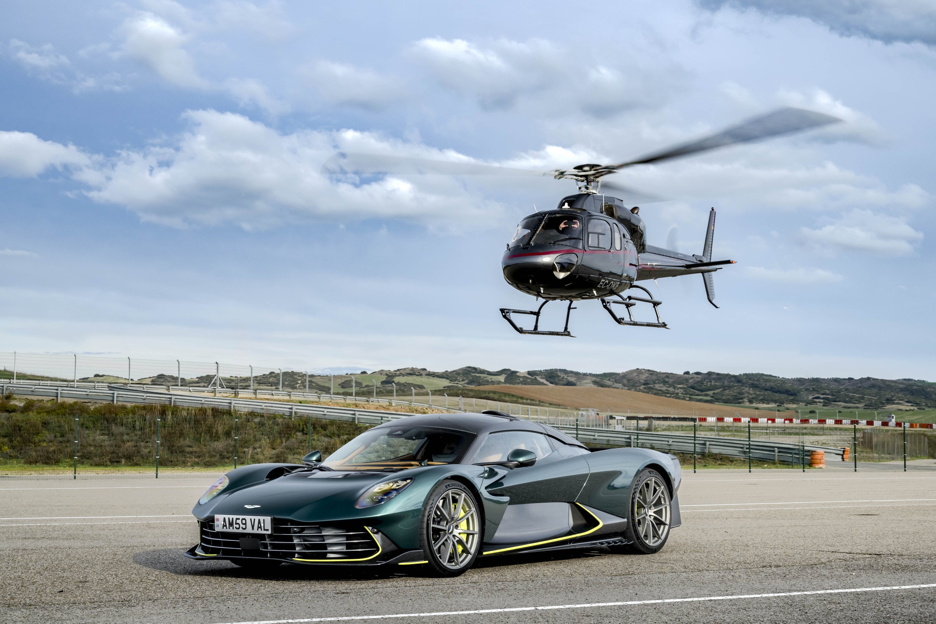 Aston Martin Valhalla alongside an owner's more typical mode of transport