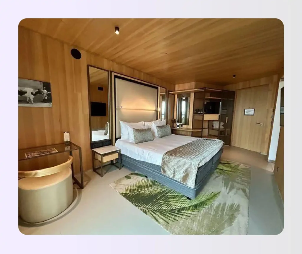 ADA accessible hotel room floor plan with 60-inch turning circle and king bed clearance 